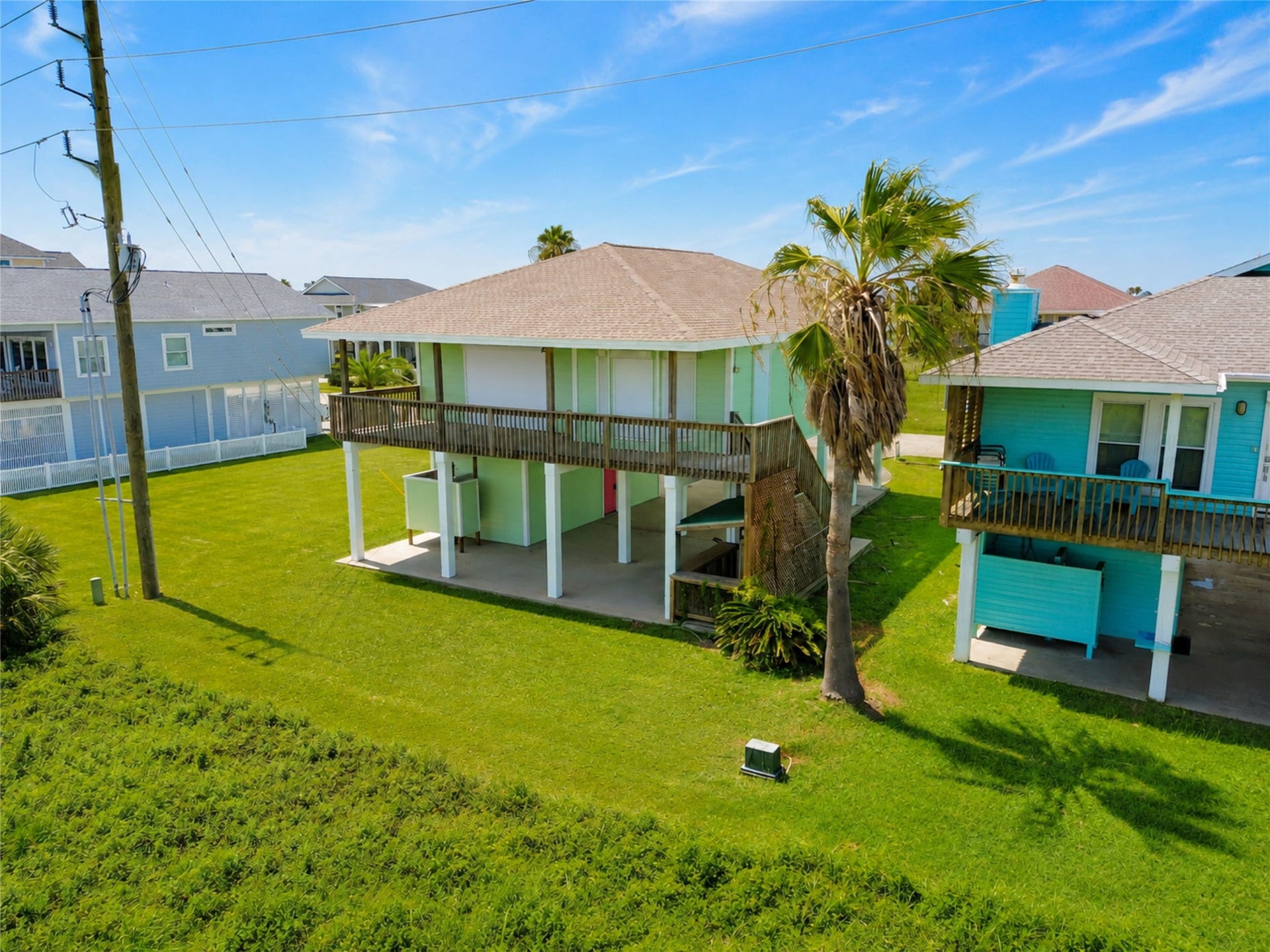 22329 Vista Del Mar, Galveston, TX 77554 Storm shutters can be found on every window and door on the main level.