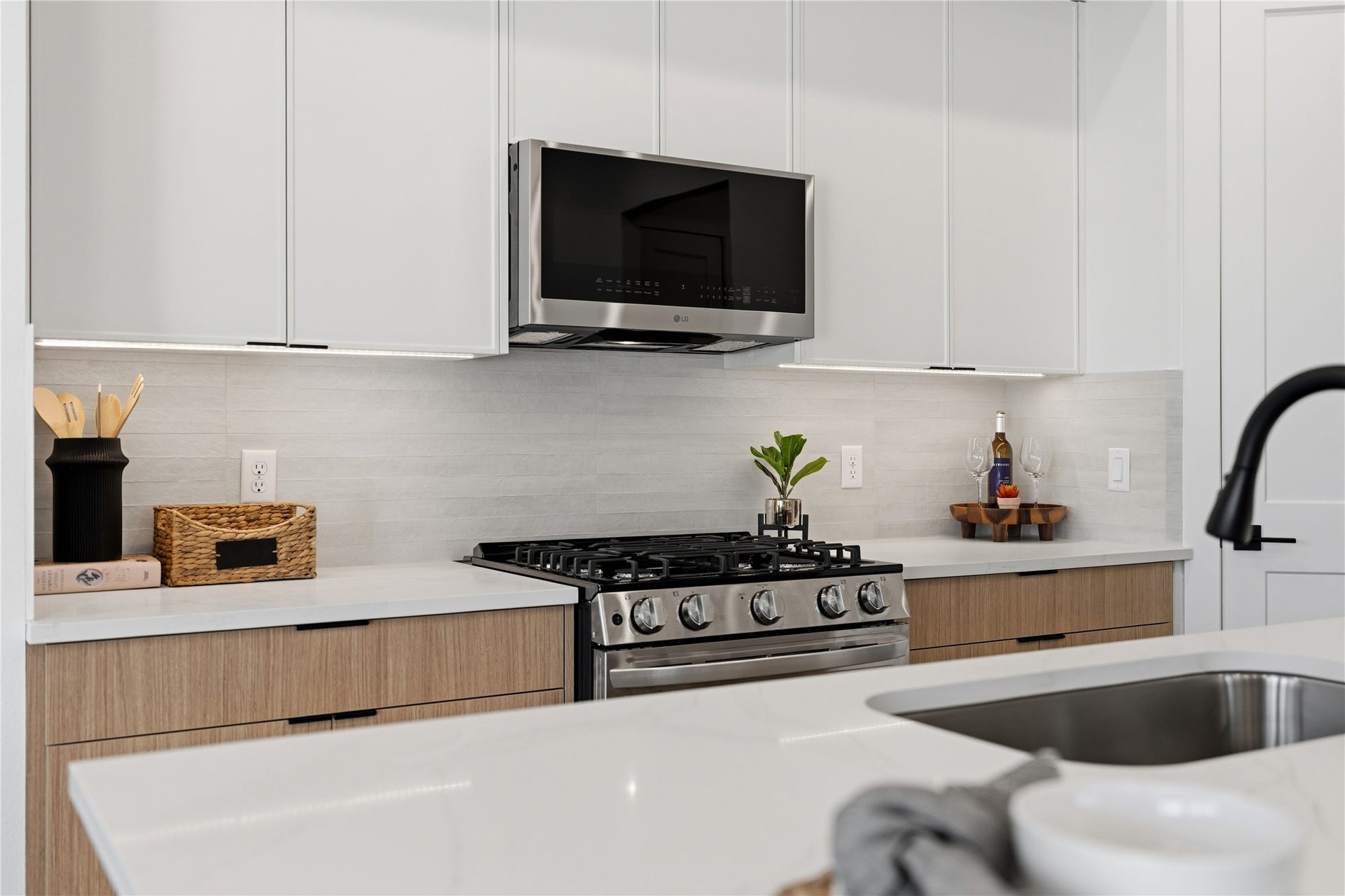 Stylish single-family kitchen with sleek finishes, ample storage, and an oversized island for everyday living.