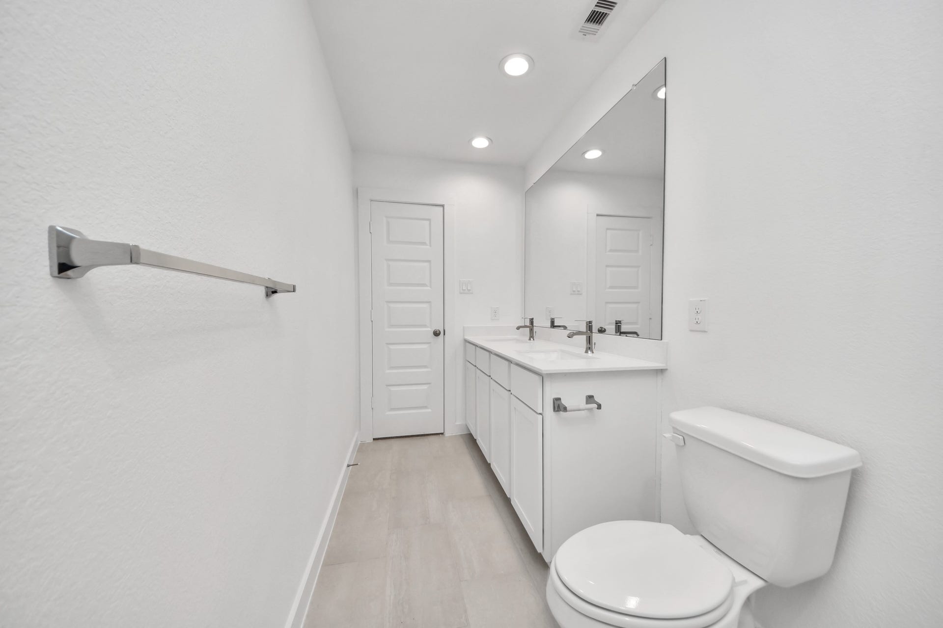 24511 Broad Park Ct, Spring, TX 77373 Secondary bath features tile flooring, bath/shower combo with tile surround, light stained wood cabinets, beautiful light countertop. Sample photo of completed home with similar floor plan. Actual colors and selections may vary.