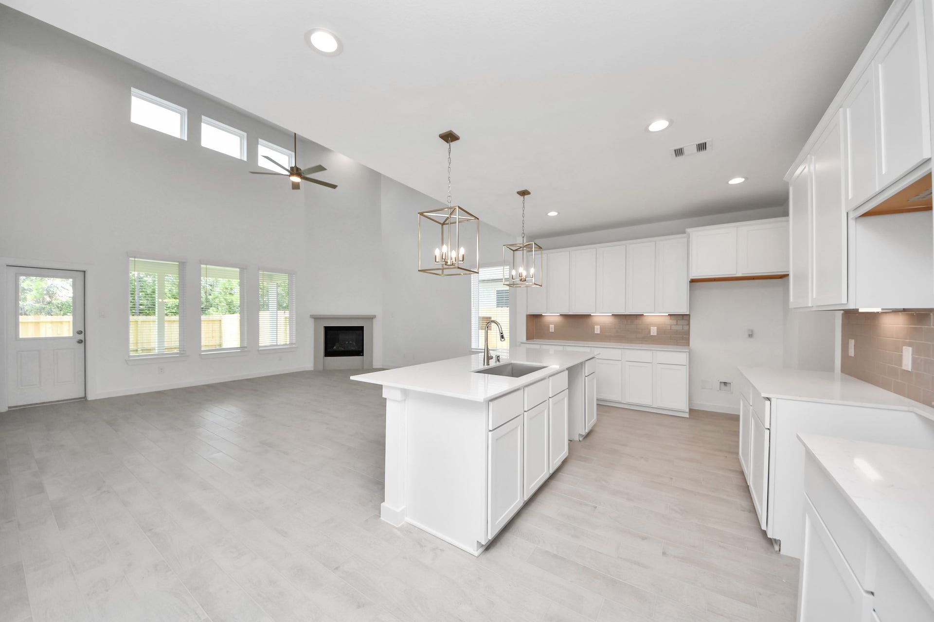 24511 Broad Park Ct, Spring, TX 77373 The open concept effortlessly connects the kitchen to the expansive family room, forming a perfect hub for gatherings. This seamless flow creates an inviting space where cooking and socializing come together harmoniously. Sample photo of completed home with similar floor plan. Actual colors and selections may vary.