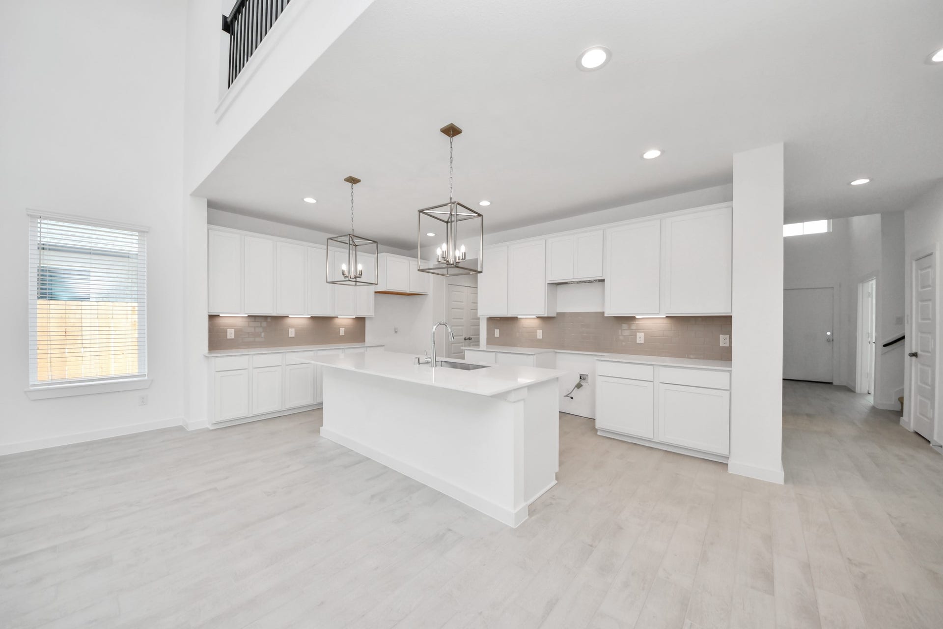 24511 Broad Park Ct, Spring, TX 77373 The kitchen is a culinary haven, featuring granite countertops, a tile backsplash, stainless steel appliances, 42 upper cabinets, and undercabinet lighting. Sample photo of completed home with similar floor plan. Actual colors and selections may vary.