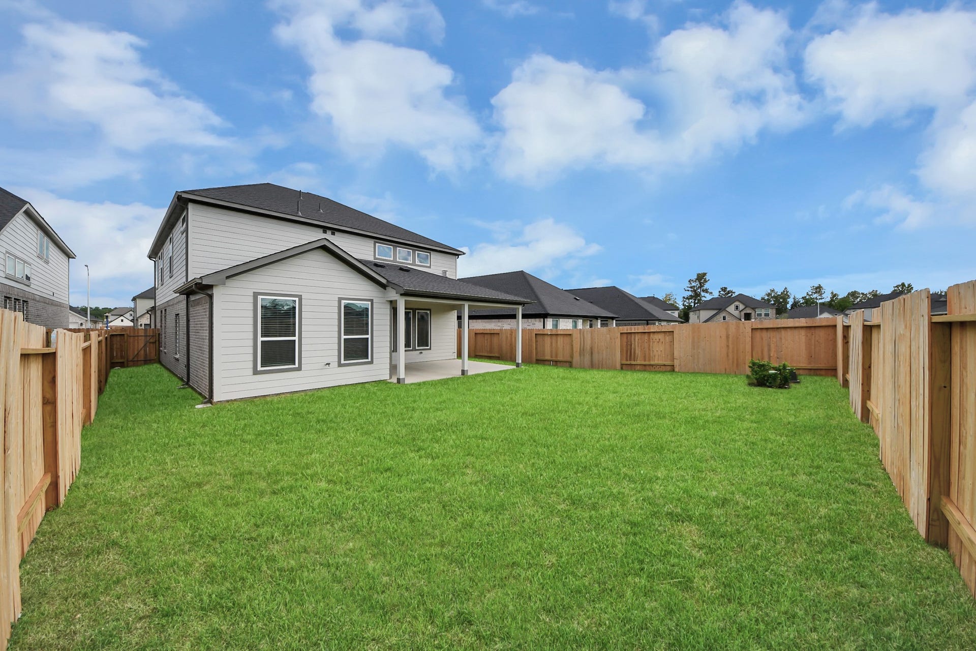 24511 Broad Park Ct, Spring, TX 77373 Experience outdoor living at its finest on this expansive covered patio, thoughtfully designed for BBQs and delightful outdoor dining.