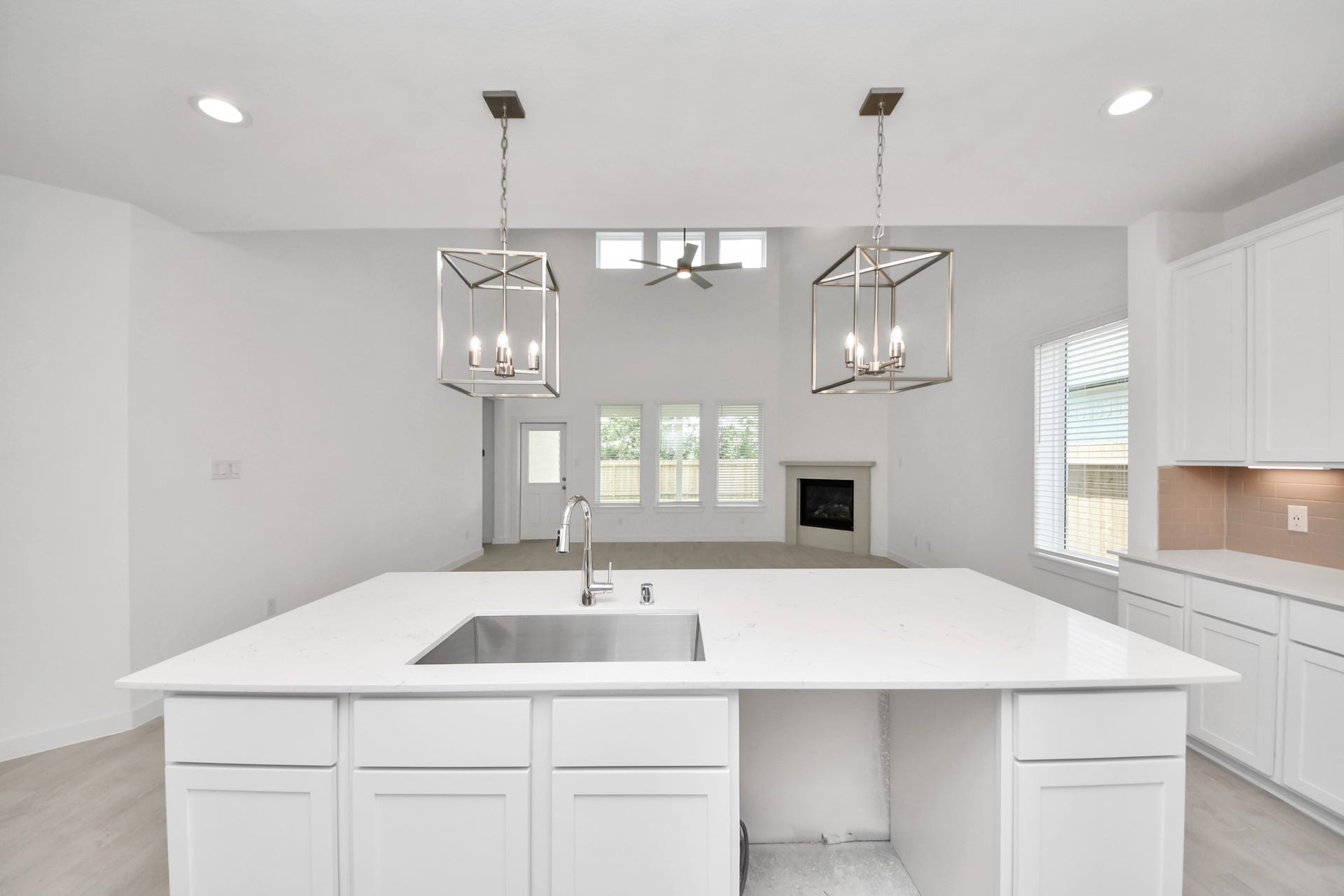 24511 Broad Park Ct, Spring, TX 77373 All of this overlooks your expansive family room, creating a perfect space for culinary delights and family gatherings. Sample photo of completed home with similar floor plan. Actual colors and selections may vary.