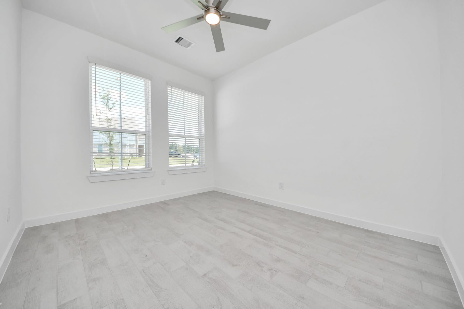 24511 Broad Park Ct, Spring, TX 77373 Step into the inviting home office, where elegant tile flooring adds a touch of freshness and comfort to the workspace. Natural light pours through the window, creating an inspiring environment for productivity and focus. Sample photo of completed home with similar floor plan. Actual colors and selections may vary.