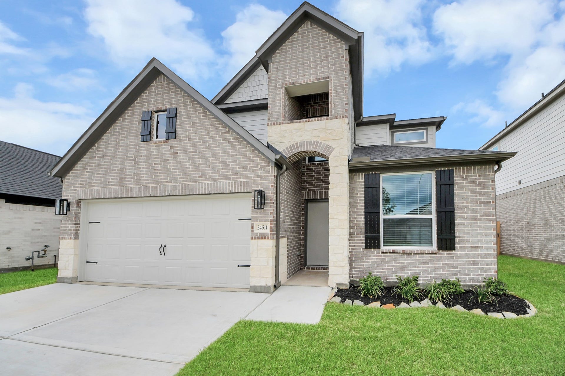 24511 Broad Park Ct, Spring, TX 77373 Home features a convenient 2-car garage complemented by a spacious driveway, offering ample parking for you and your guests.
