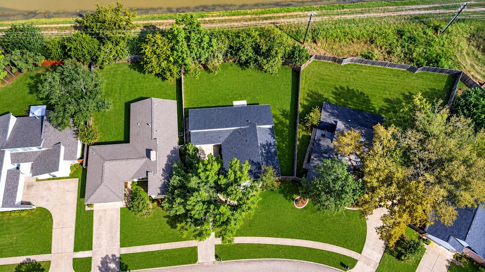1826 Hilton Head Drive, Missouri City, TX 77459 Aerial view showcasing the expansive lot with no rear neighbors, offering added privacy and an open backdrop.