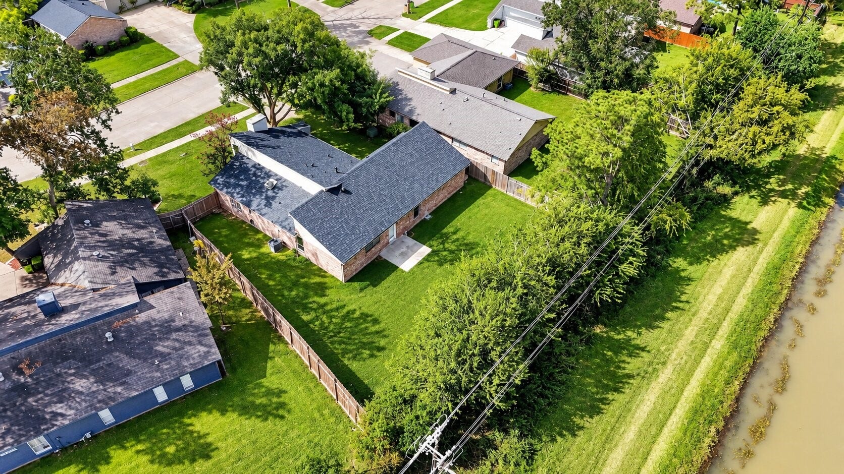 1826 Hilton Head Drive, Missouri City, TX 77459 Aerial view showcasing the expansive lot with no rear neighbors, offering added privacy and an open backdrop.
