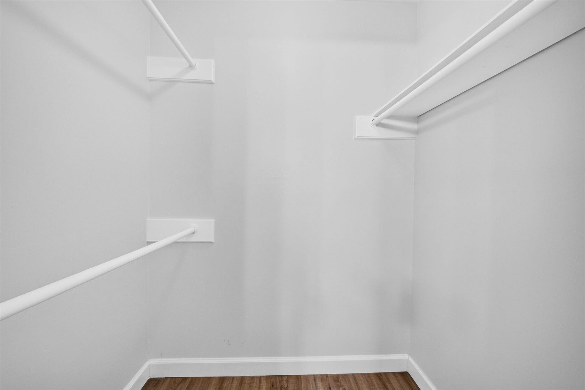 1826 Hilton Head Drive, Missouri City, TX 77459 Spacious primary bedroom featuring two walk-in closets, offering plenty of comfort and storage space.