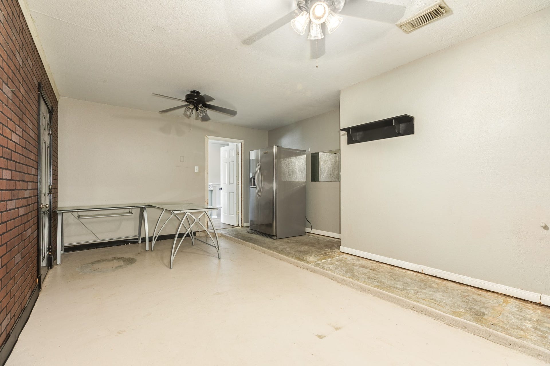 3425 Van Ness Drive, Alvin, TX 77511 Enclosed garage was used for 4th bedroom and home office.