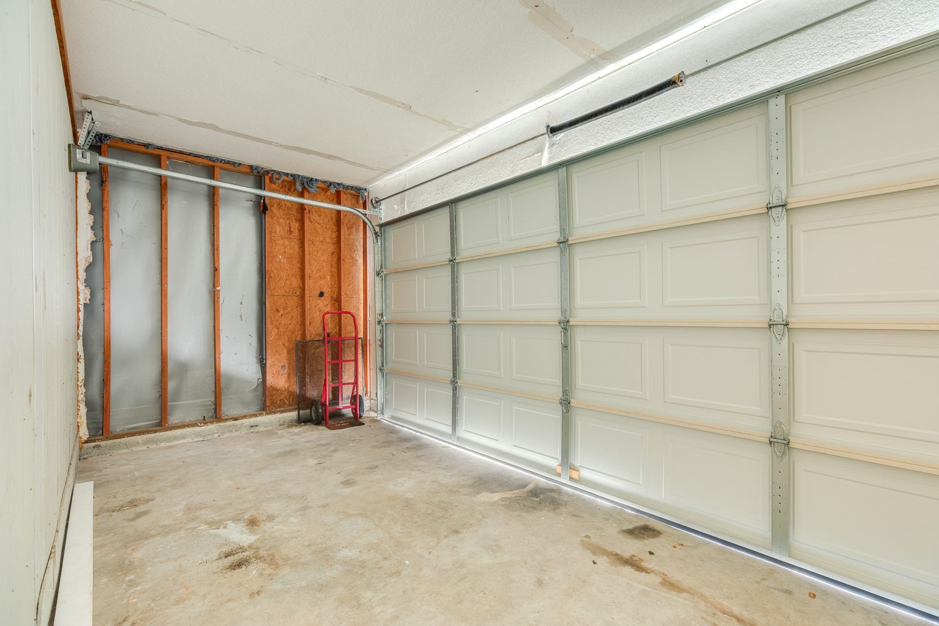 3425 Van Ness Drive, Alvin, TX 77511 Storage area with garage door to driveway