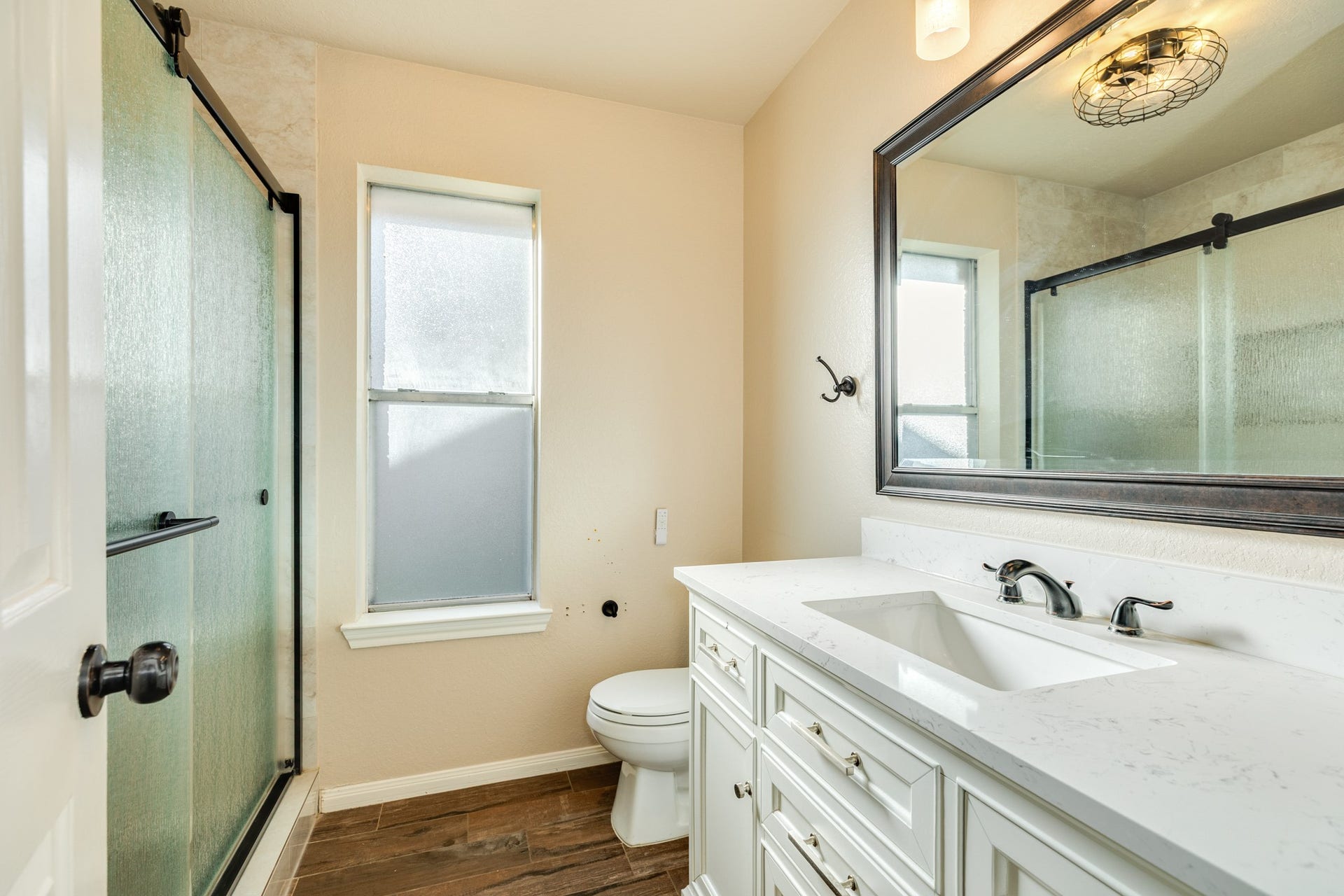3425 Van Ness Drive, Alvin, TX 77511 Updated secondary bathroom with tub shower combo.