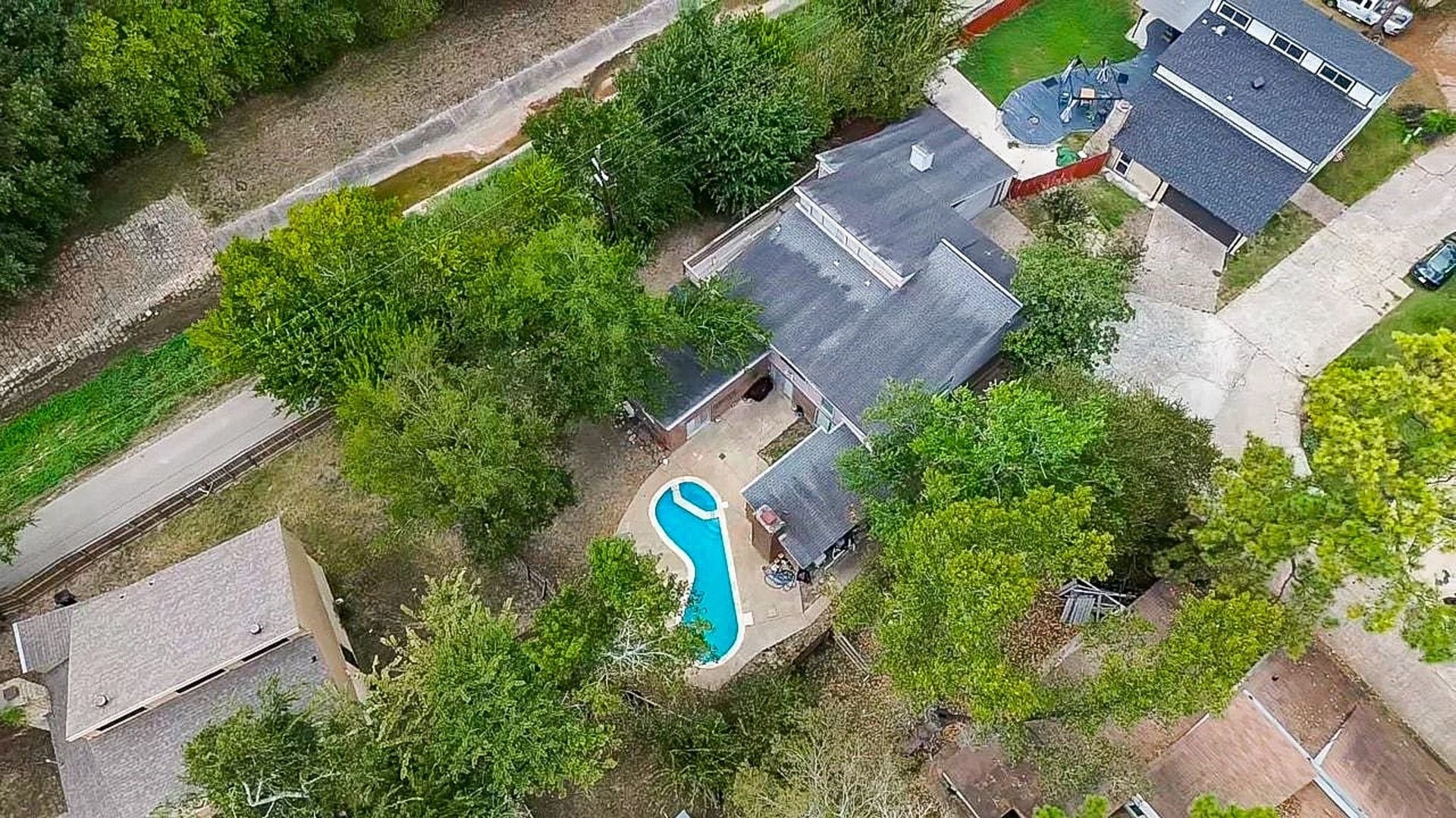 17821 S Cypress Villas Drive, Spring, TX 77379 On the neighborhoods second-largest lot (per seller) with pool, patio, and mature trees.