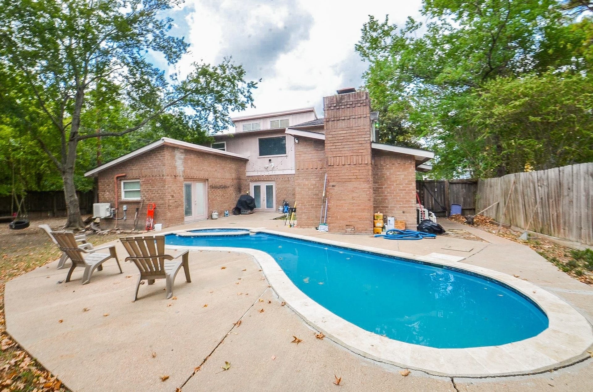 17821 S Cypress Villas Drive, Spring, TX 77379 Welcome to this private backyard oasis: an in-ground pool recently replastered with new coping (per seller), an expansive concrete patio for lounging, and mature shade trees.