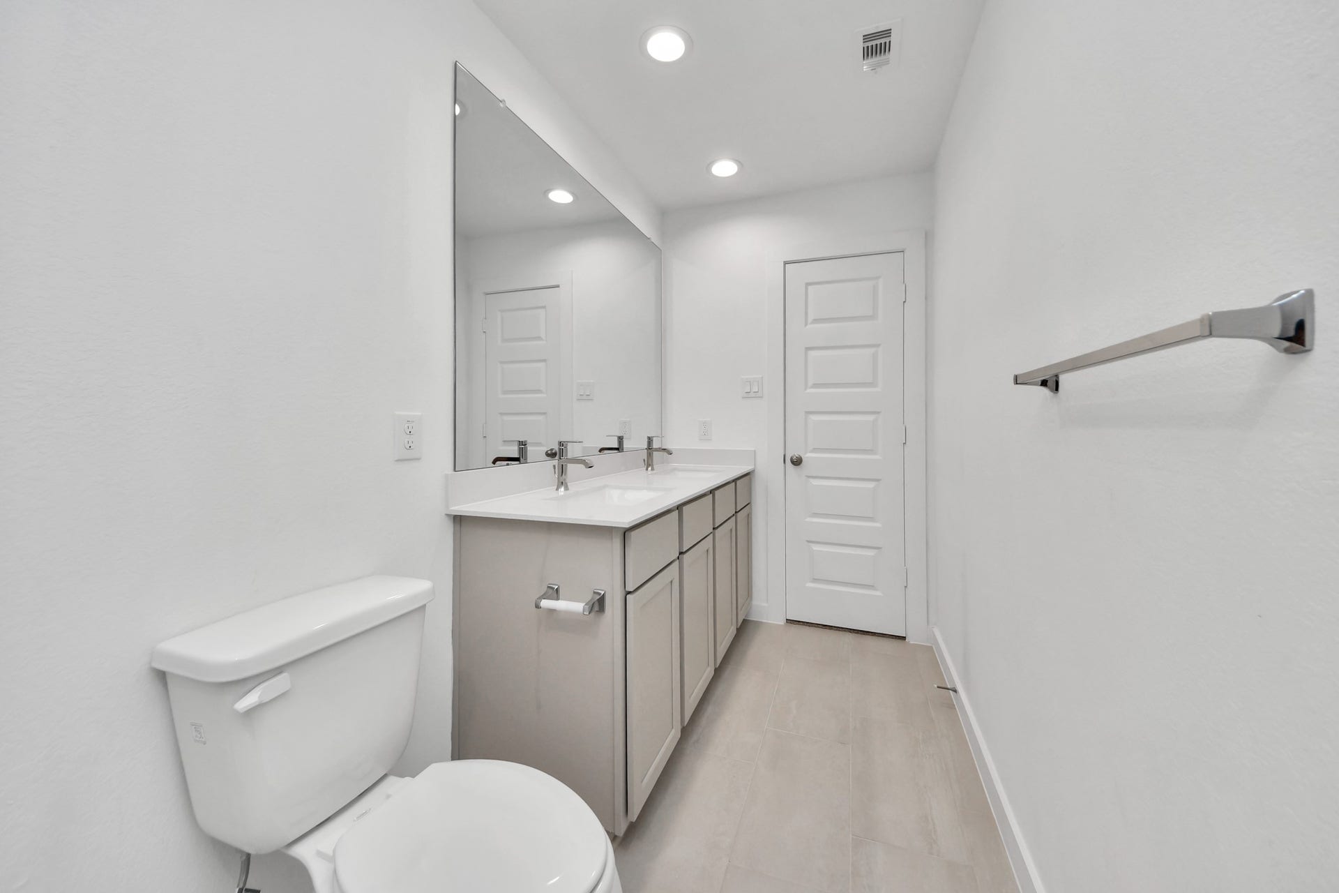 2203 Demeter Place, Fresno, TX 77545 Secondary bath features tile flooring, bath/shower combo with tile surround, light stained wood cabinets, beautiful light countertop. Sample photo of completed home with similar floor plan. Actual colors and selections may vary.