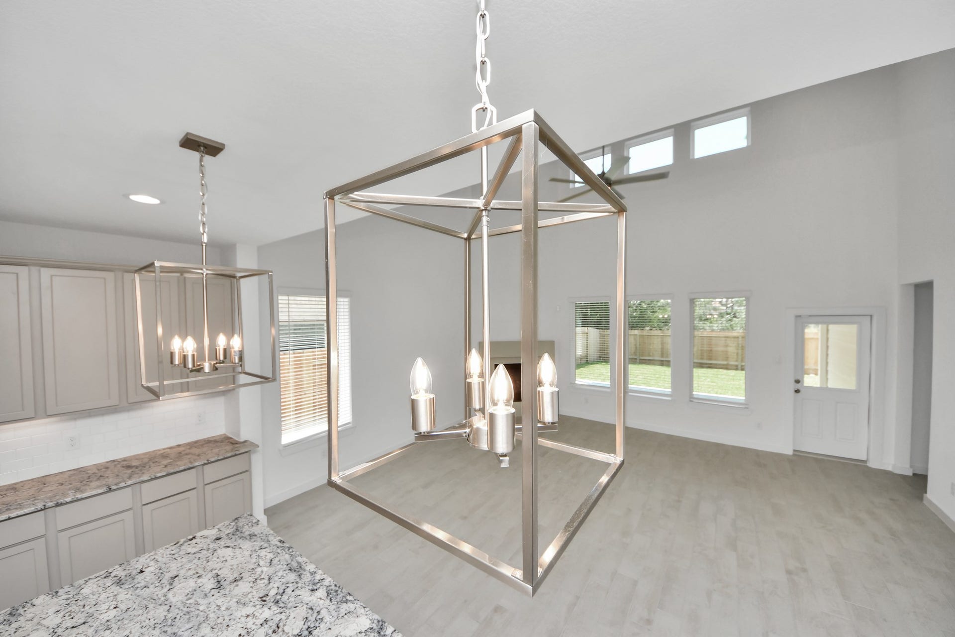 2203 Demeter Place, Fresno, TX 77545 All of this overlooks your expansive family room, creating a perfect space for culinary delights and family gatherings. Sample photo of completed home with similar floor plan. Actual colors and selections may vary.