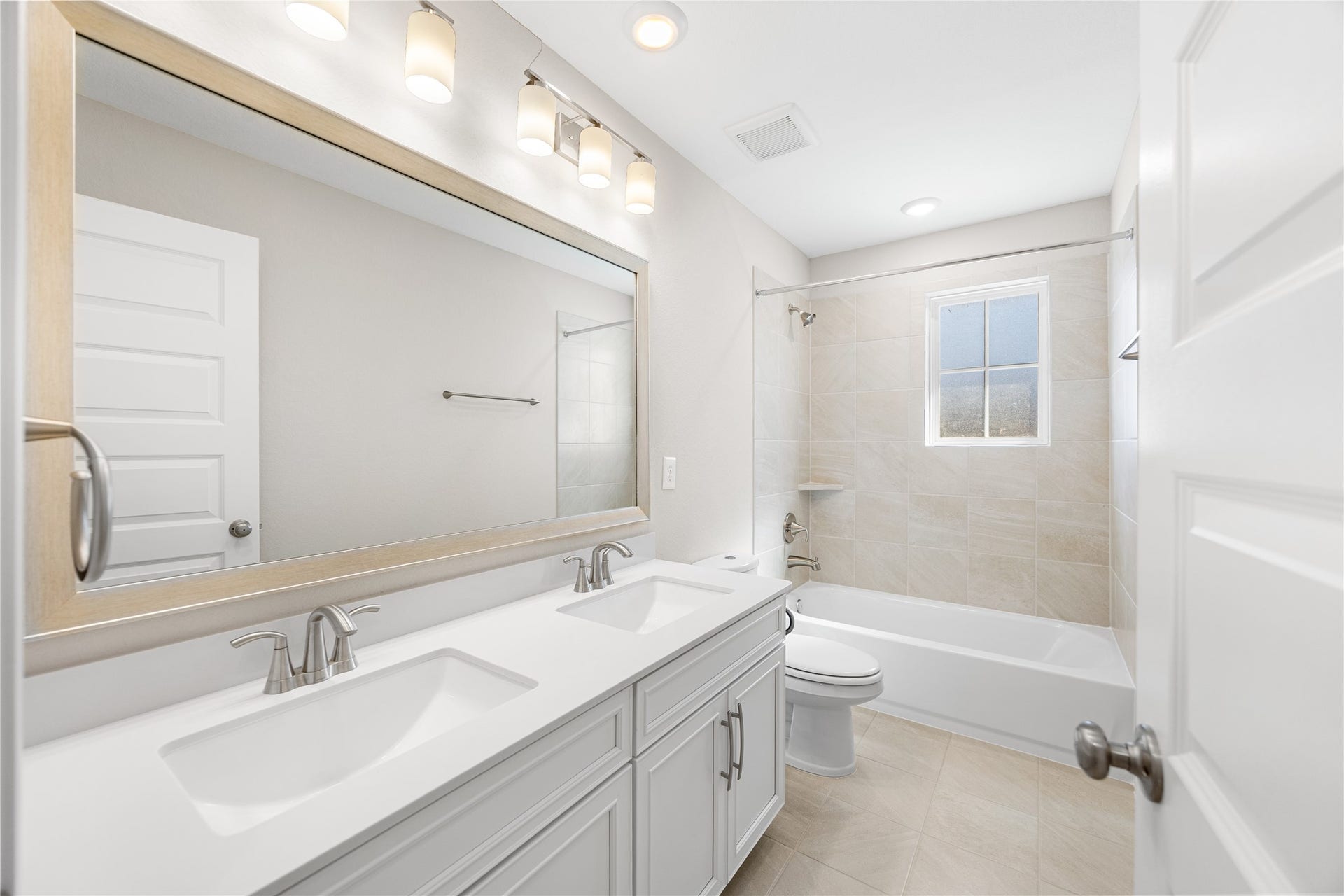 Upstairs features two full bathrooms