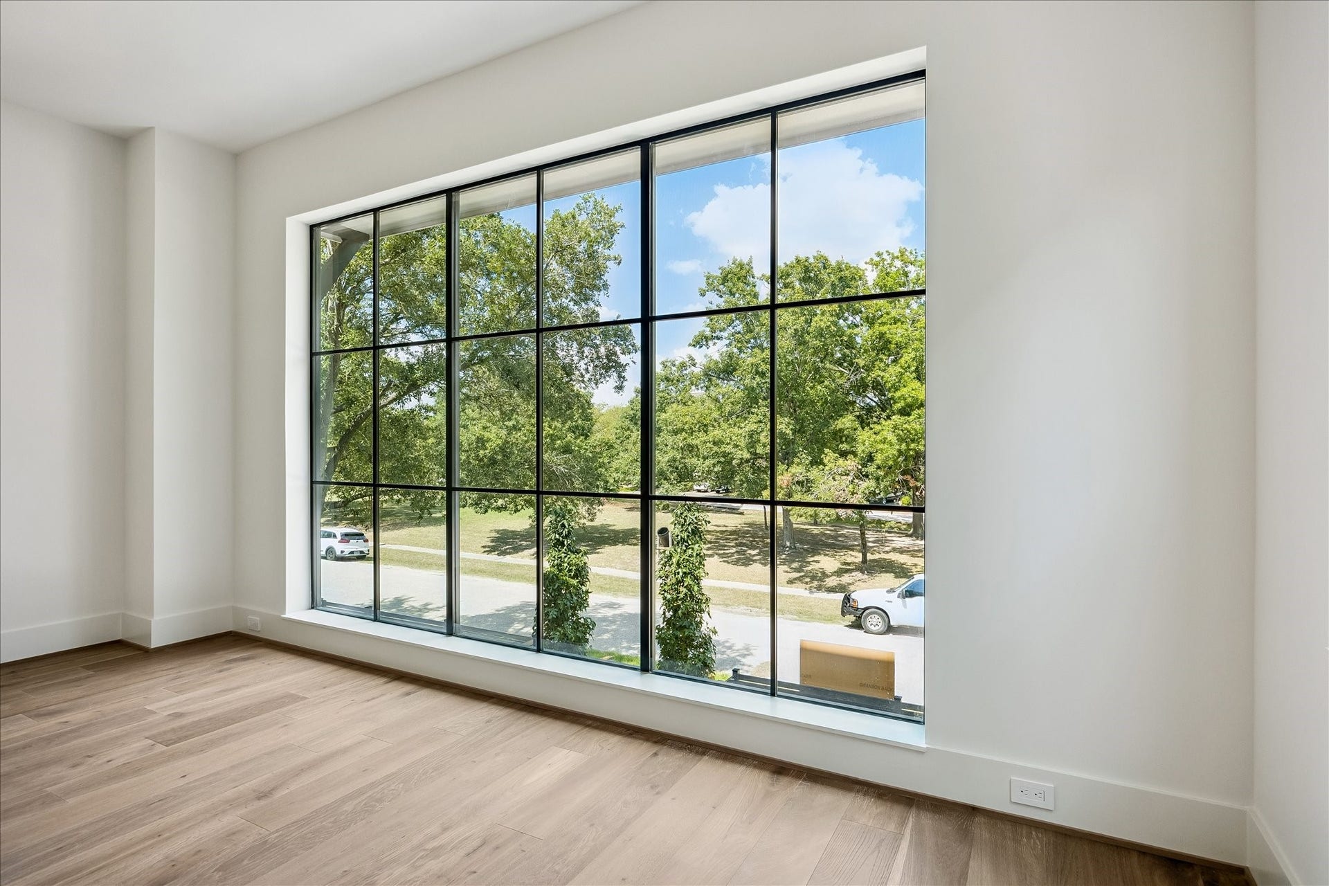 6303 Rodrigo Street, #A, Houston, TX 77007 Primary suite oversized window provides beautiful views and fills the room with natural light.