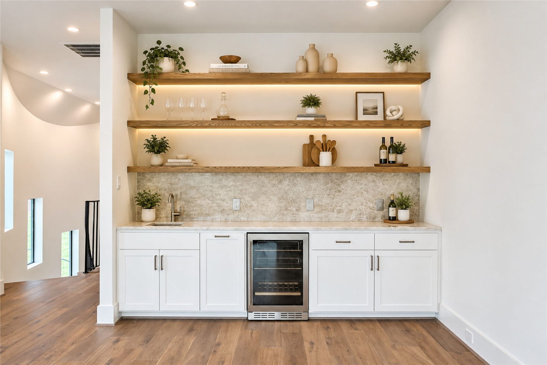6303 Rodrigo Street, #A, Houston, TX 77007 Game room features an entertainment bar features custom cabinetry, floating shelves, and a beverage cooler. (virtual staging)