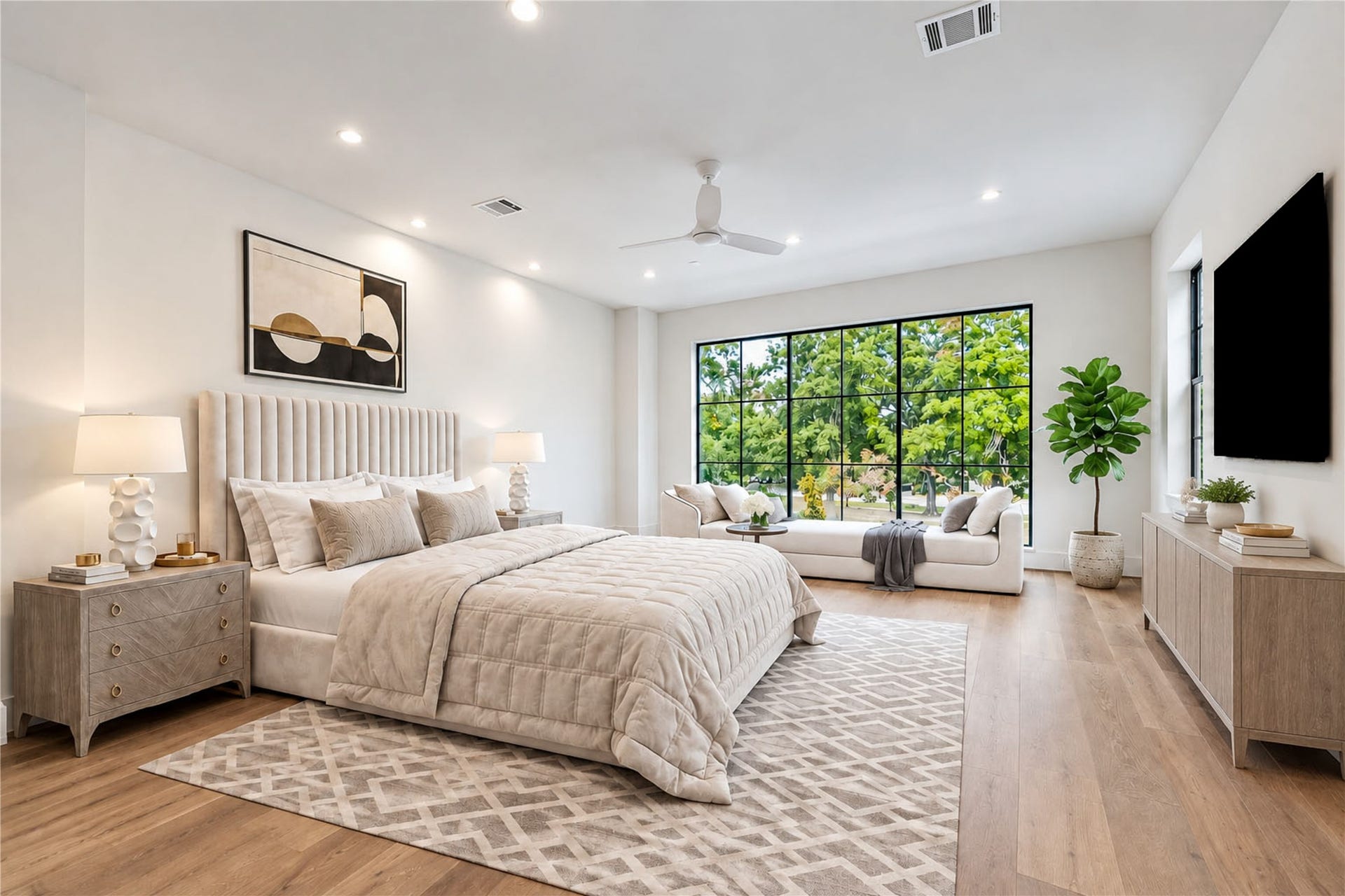 6303 Rodrigo Street, #A, Houston, TX 77007 Another view of the primary suite offers a ceiling fan and an abundance of natural light. (virtual staging)