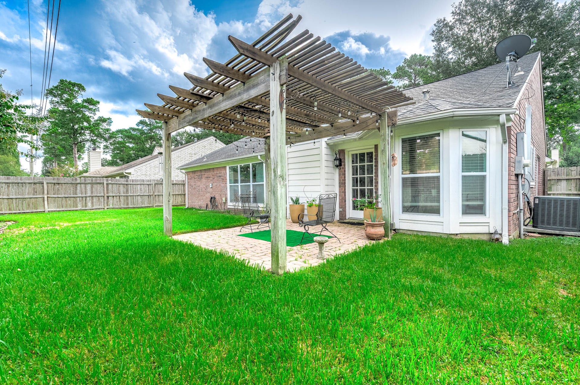 8914 Sunny Point Drive, Spring, TX 77379 Come and see this spacious
backyard with a beautiful patio!