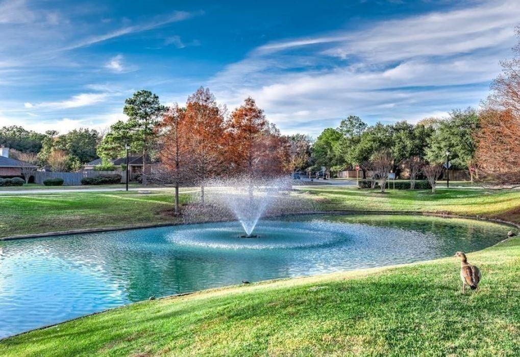 8914 Sunny Point Drive, Spring, TX 77379 Colony Creek Village has a beautiful fountain!