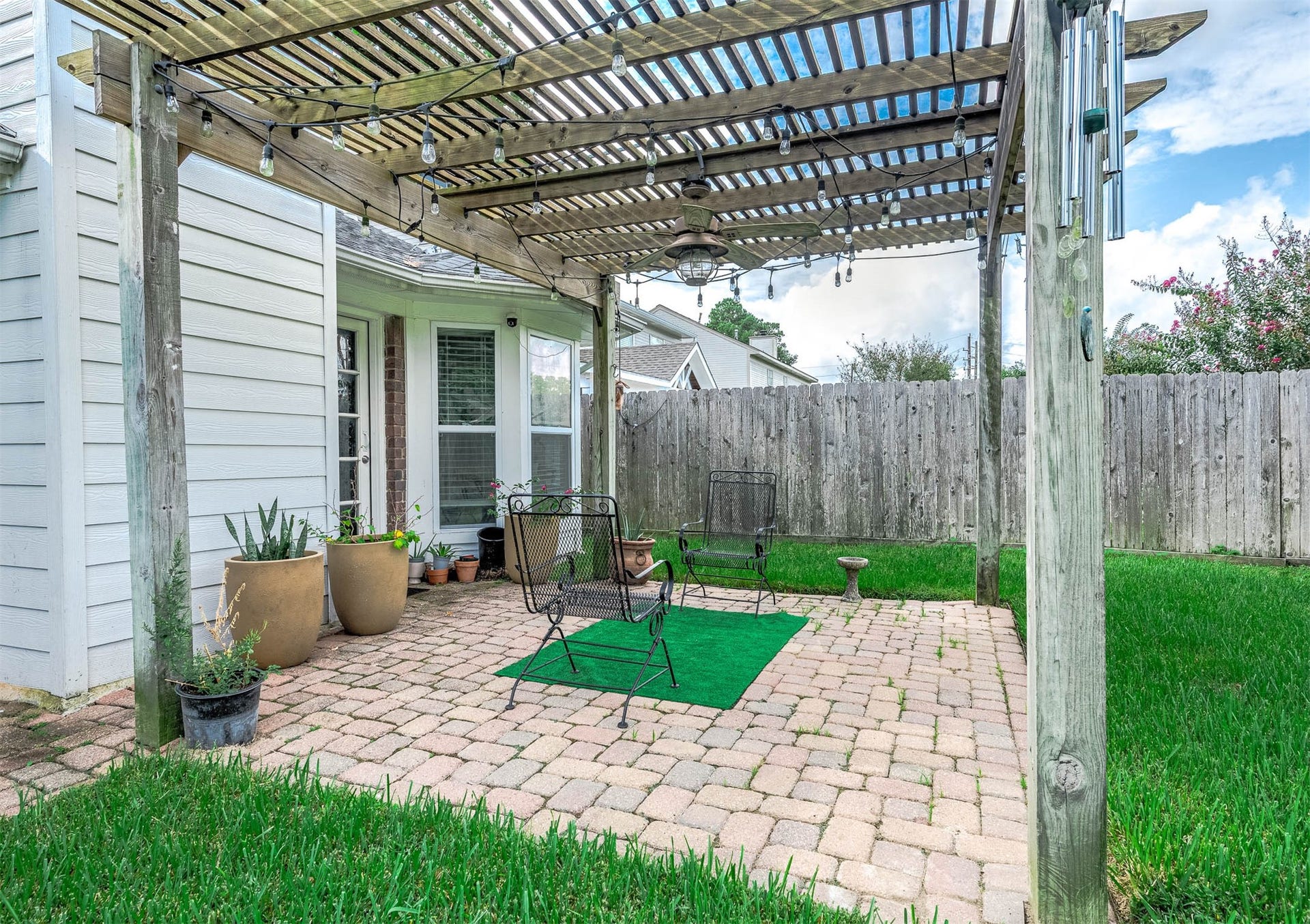 8914 Sunny Point Drive, Spring, TX 77379 Come and see this spacious
backyard with a beautiful patio!