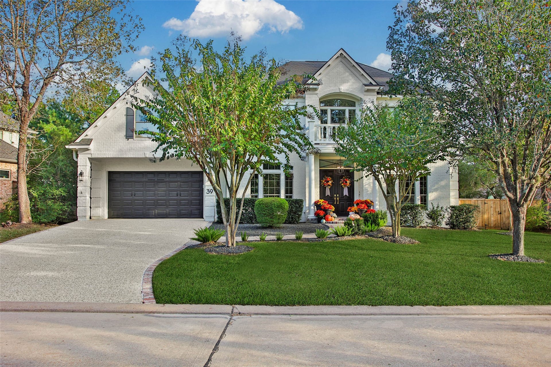 39 W Old Sterling Circle, The Woodlands, TX 77382 Discover timeless elegance at 39 W Old Sterling, where classic architecture meets lush landscaping, creating an inviting sanctuary in a serene neighborhood.