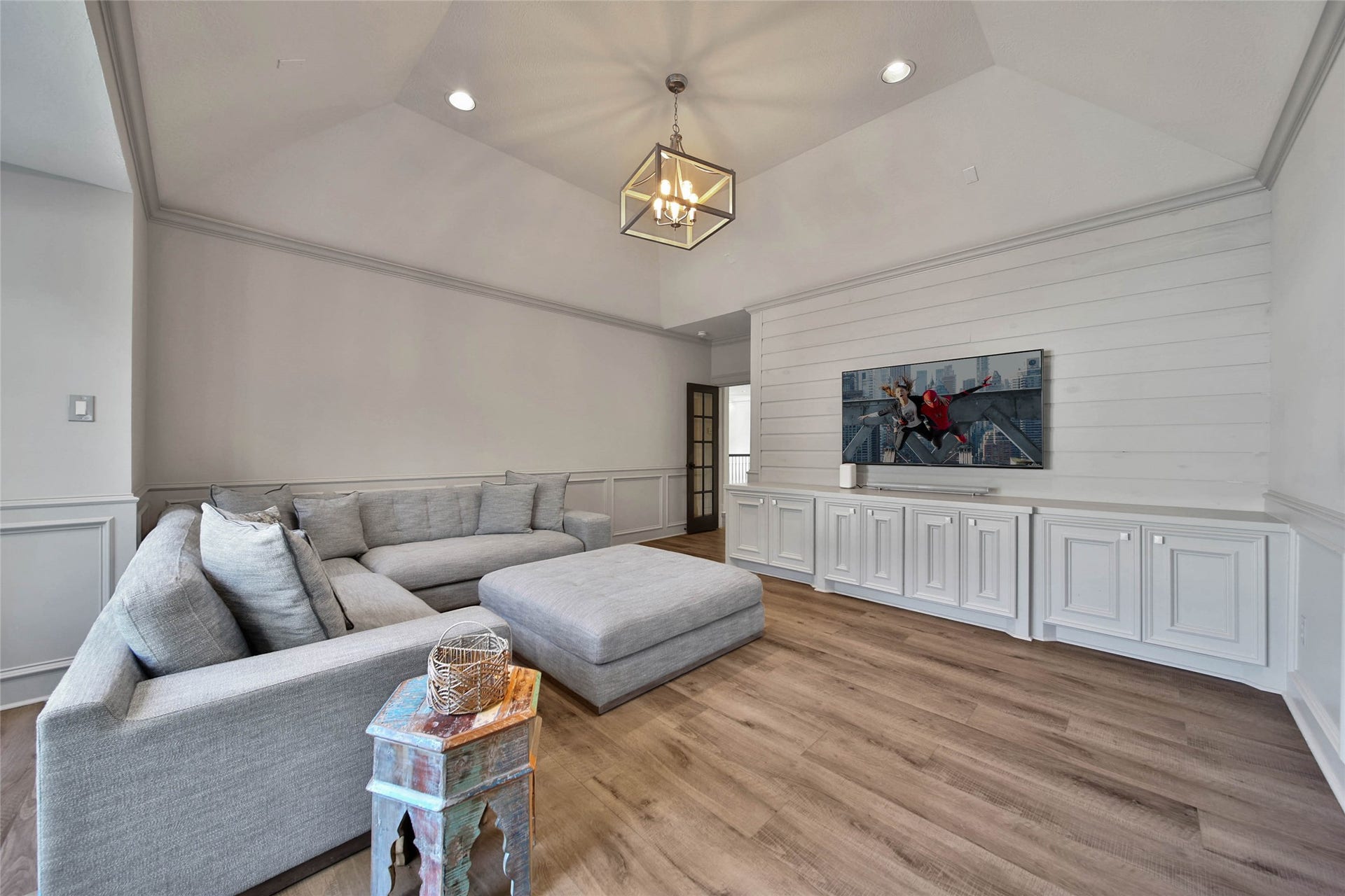 39 W Old Sterling Circle, The Woodlands, TX 77382 Stylish built-ins in the game room offer ample storage and a seamless entertainment setup.