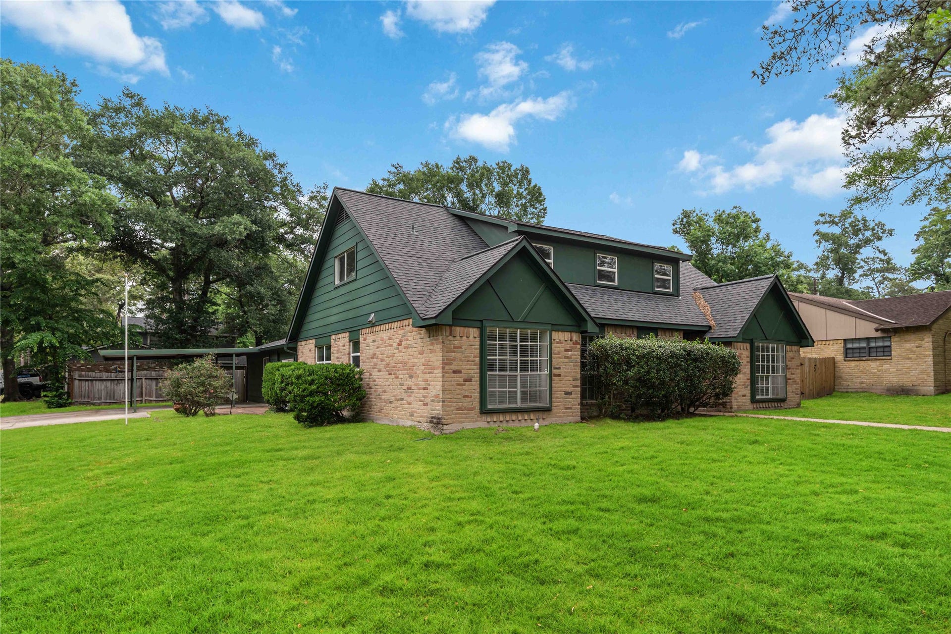 203 Wedgewood Court, Oak Ridge North, TX 77386 Side view