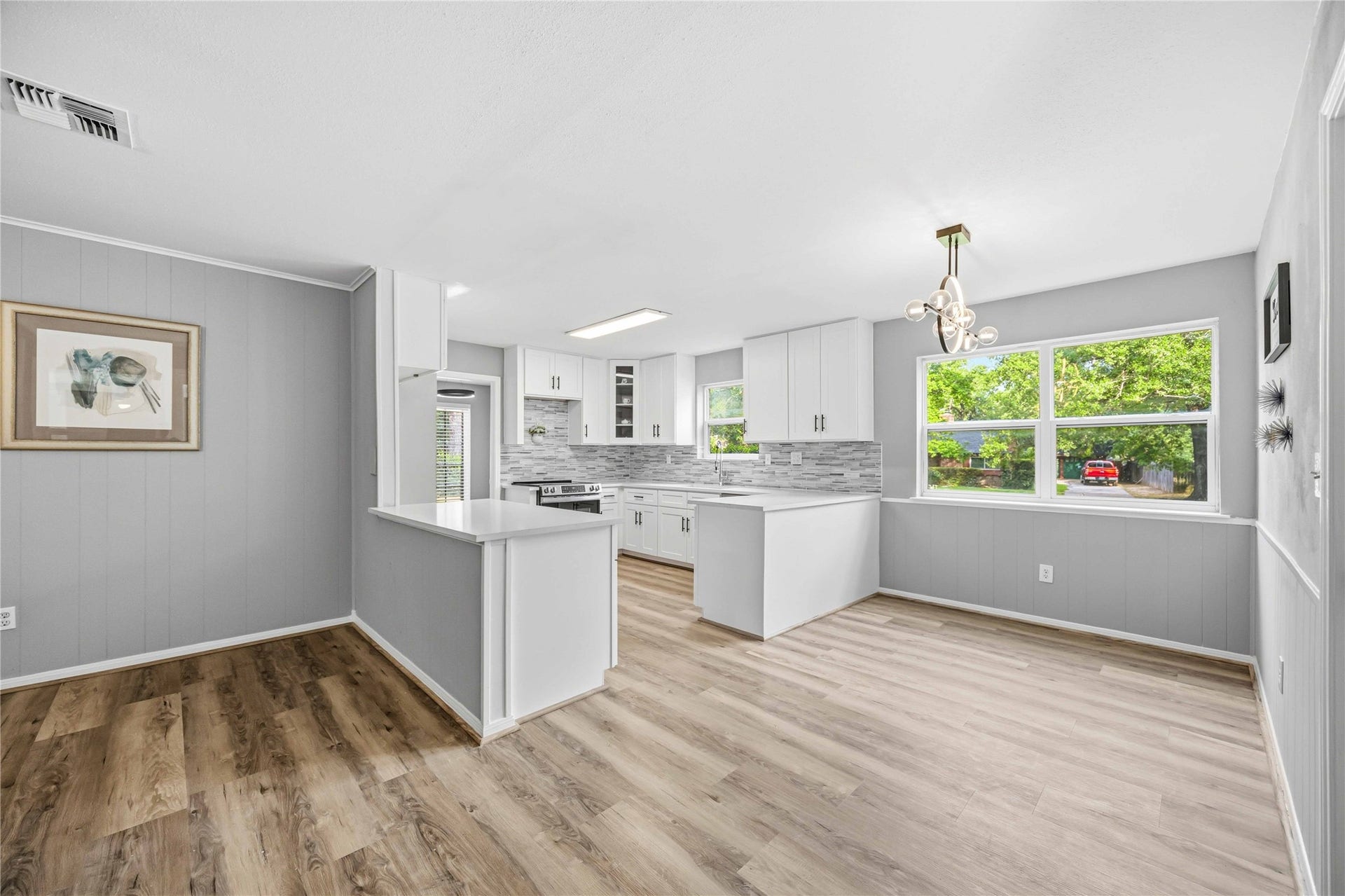 203 Wedgewood Court, Oak Ridge North, TX 77386 From living area to kitchen