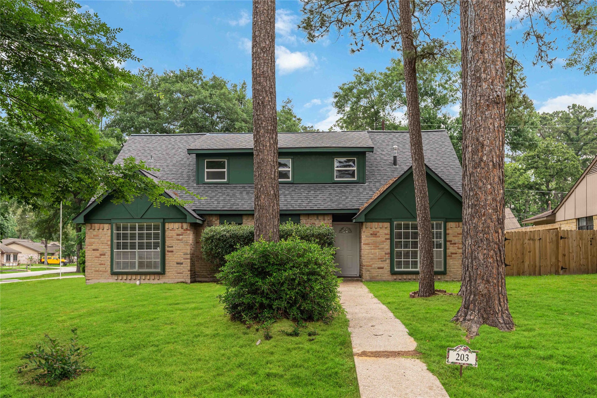 203 Wedgewood Court, Oak Ridge North, TX 77386 Another view of front view