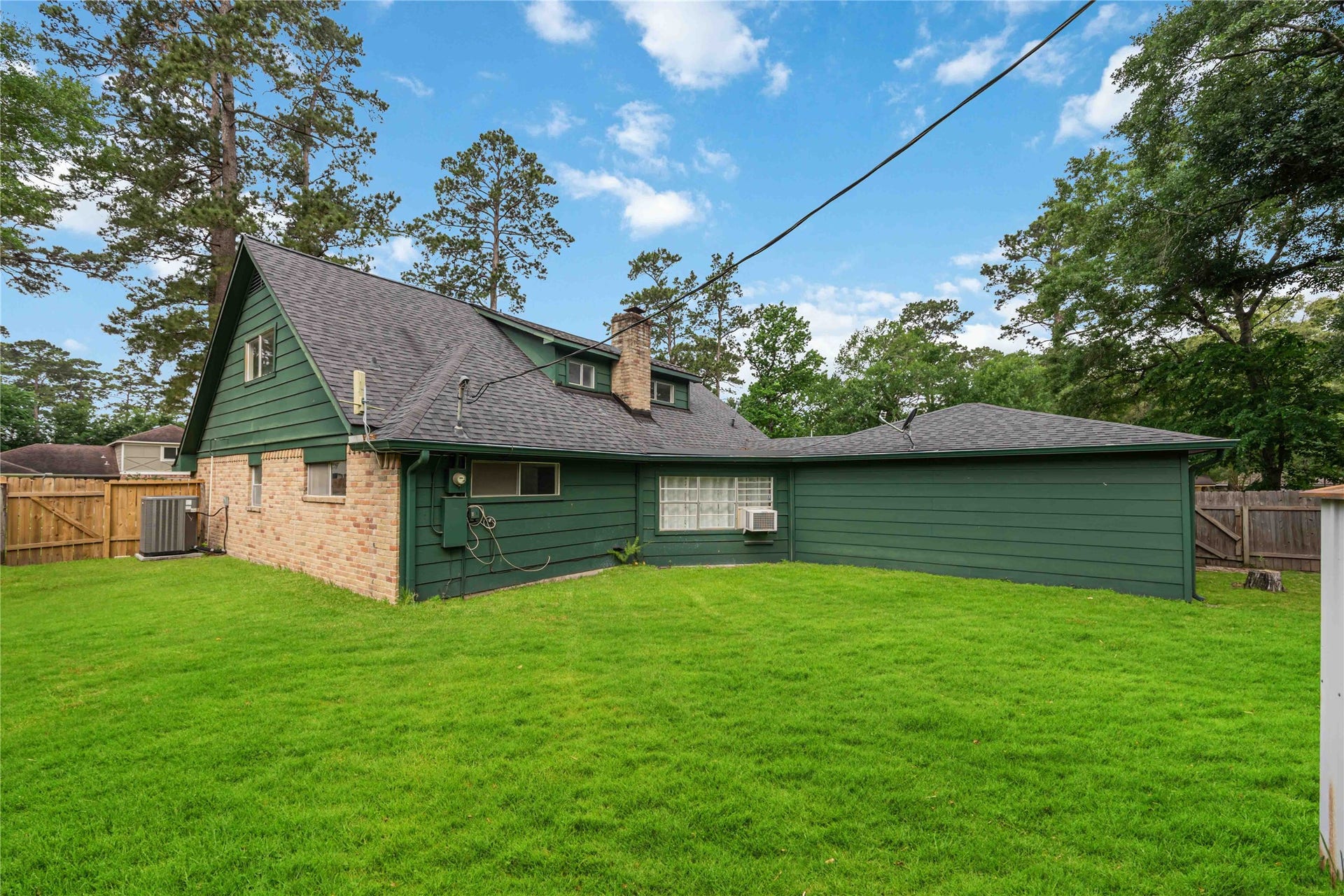 203 Wedgewood Court, Oak Ridge North, TX 77386 Backyard