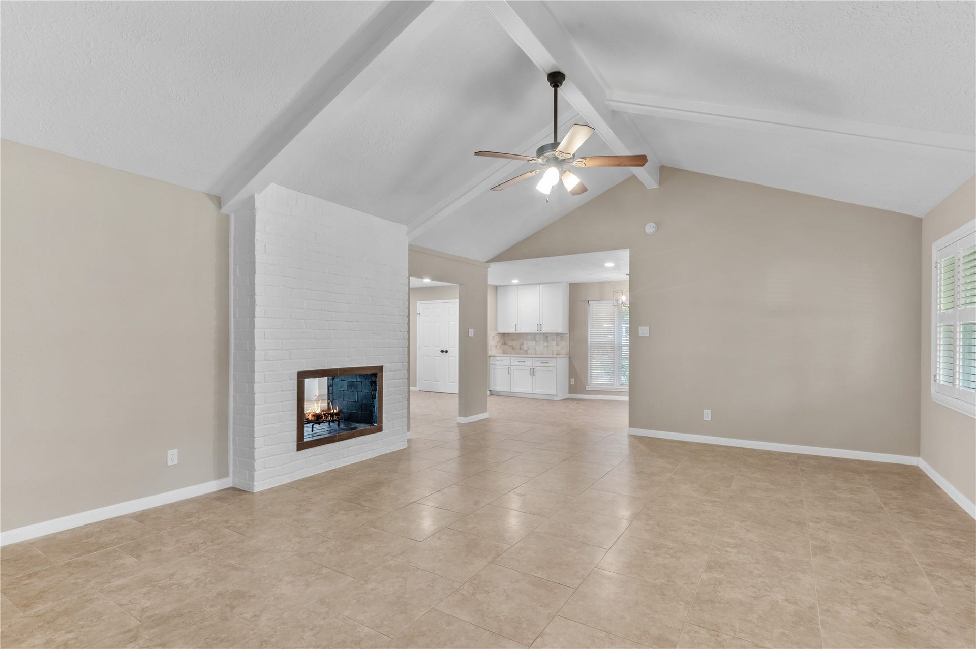 27249 Lana Lane, Oak Ridge North, TX 77385 Large first living room looking toward dining