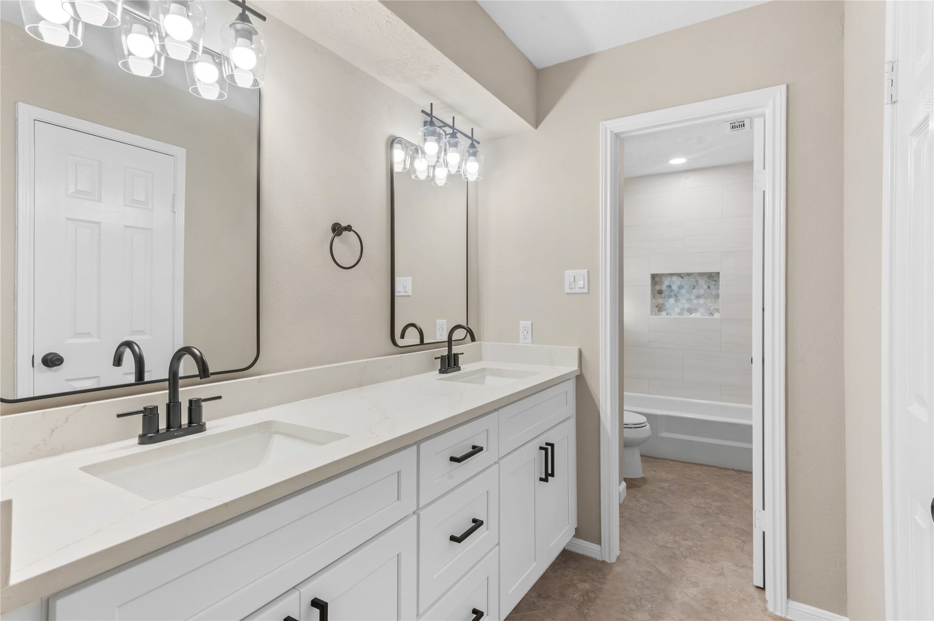 27249 Lana Lane, Oak Ridge North, TX 77385 Updated master bathroom with double sinks!