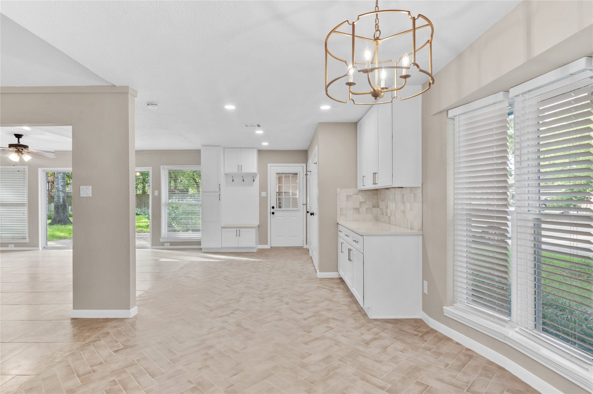 27249 Lana Lane, Oak Ridge North, TX 77385 Looking toward back door, mud area, and second living room!