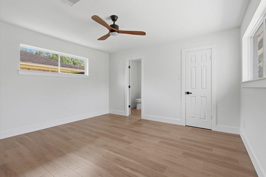 104 Oriole Lane, Angleton, TX 77515 The primary bedroom is thoughtfully separated from the secondary bedrooms, creating a private retreat for added comfort. Featuring abundant natural light, peaceful backyard views, and thoughtful updates throughout, this space offers a relaxing environment designed for peace of mind.