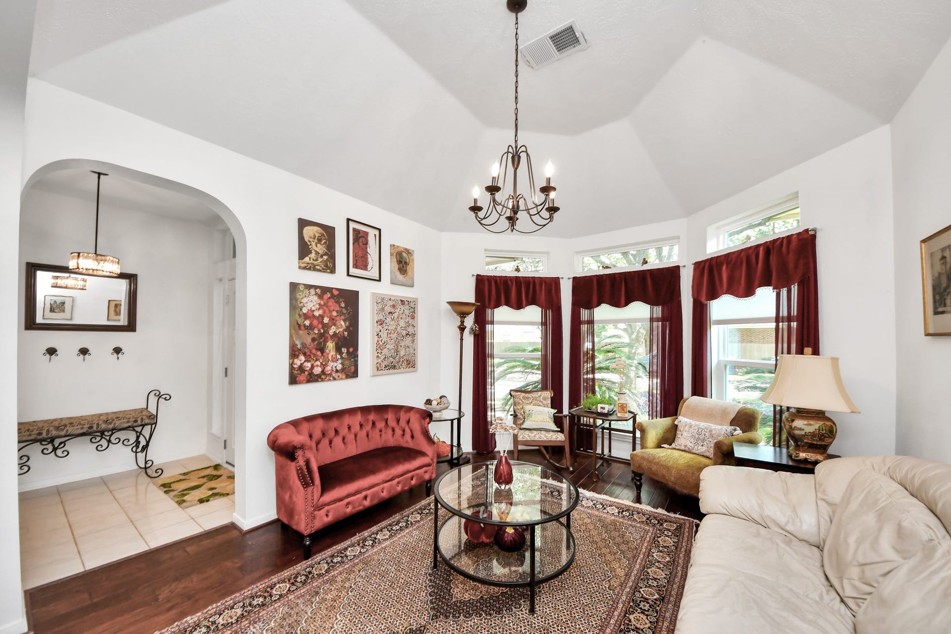 Another view showing the size of the formal living room and its connection to the dining area.