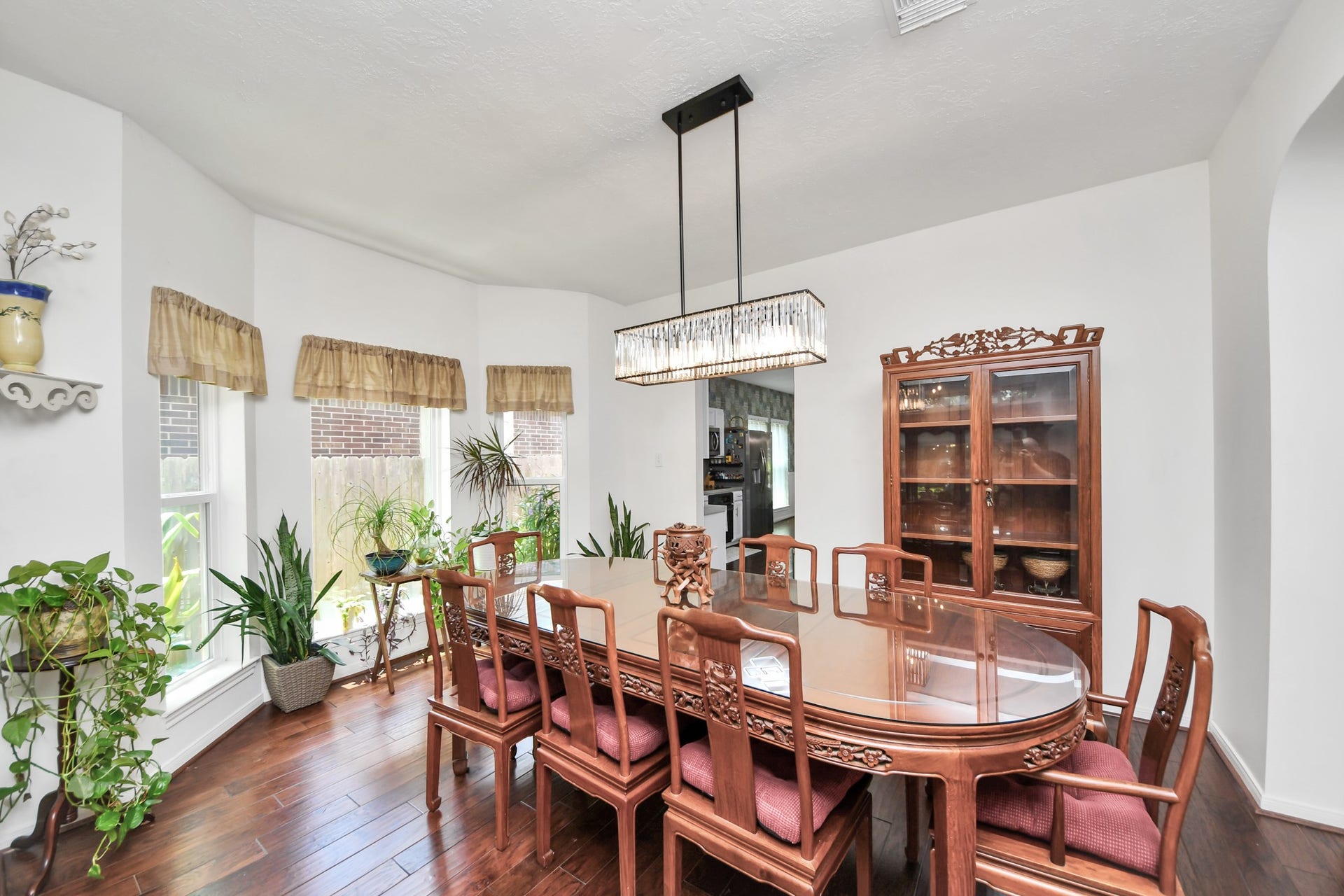 Spacious formal dining room with room for a large table and additional furniture.