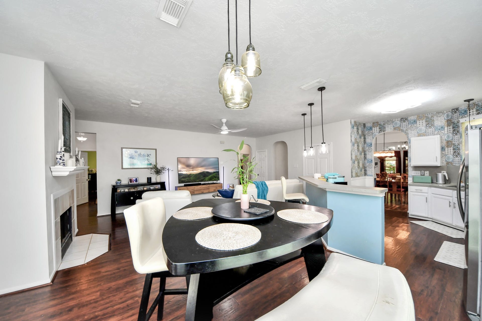 Breakfast area located just off the kitchen with convenient access to the covered patio.