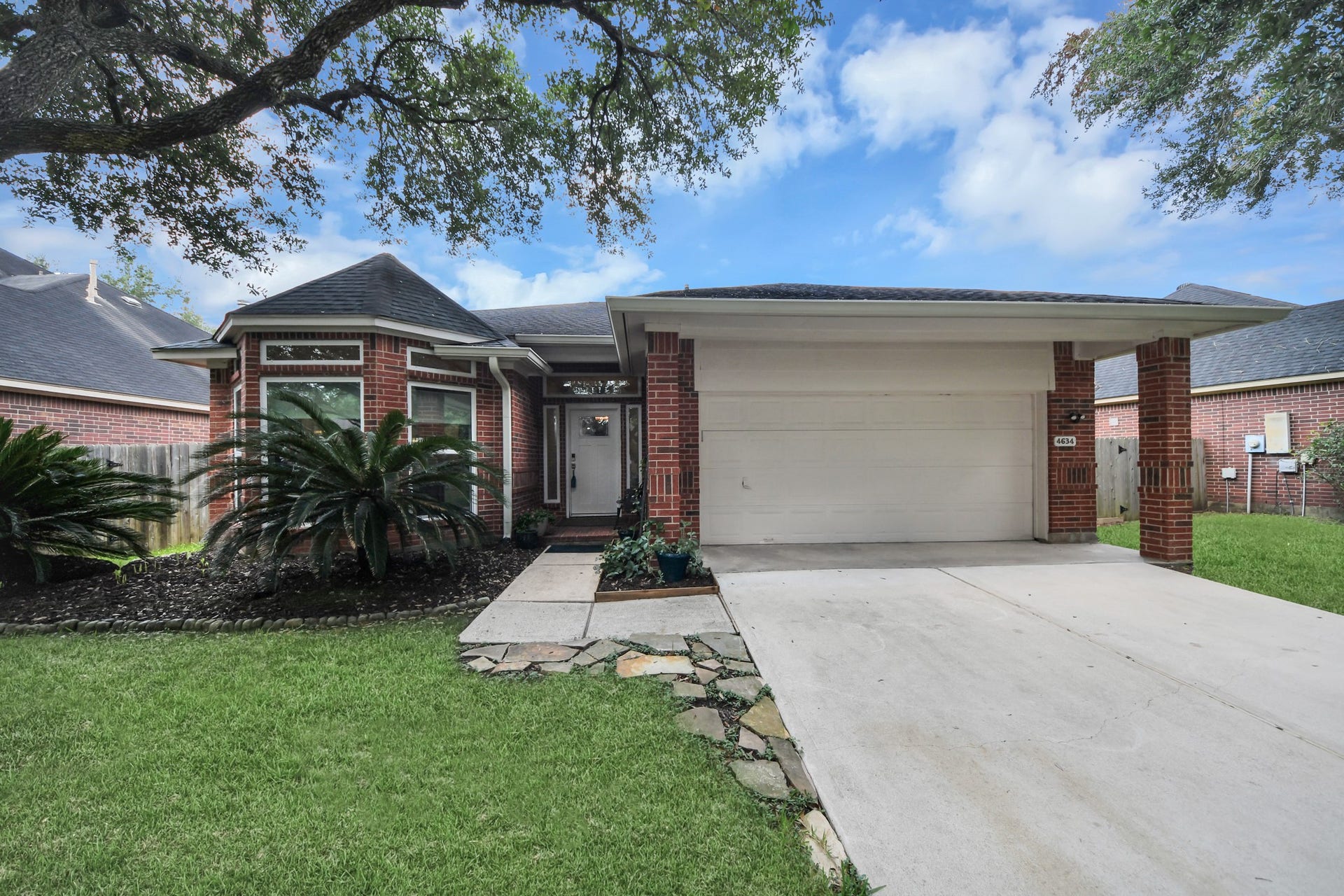 Welcome to 4634 Jaymar Drive, a one-story home tucked beneath beautiful mature trees.