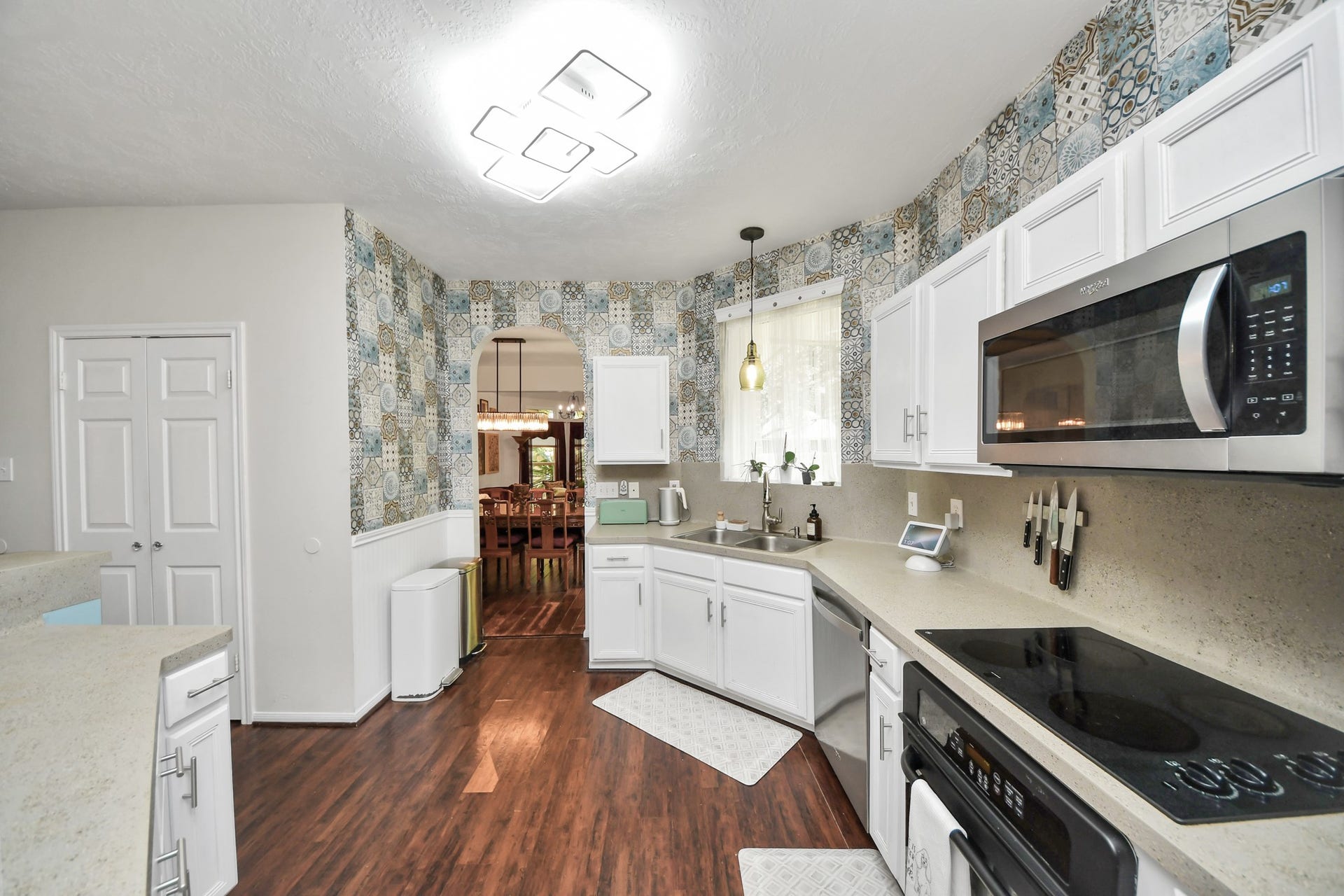 Additional kitchen storage and counter space with a direct connection to the formal dining room.