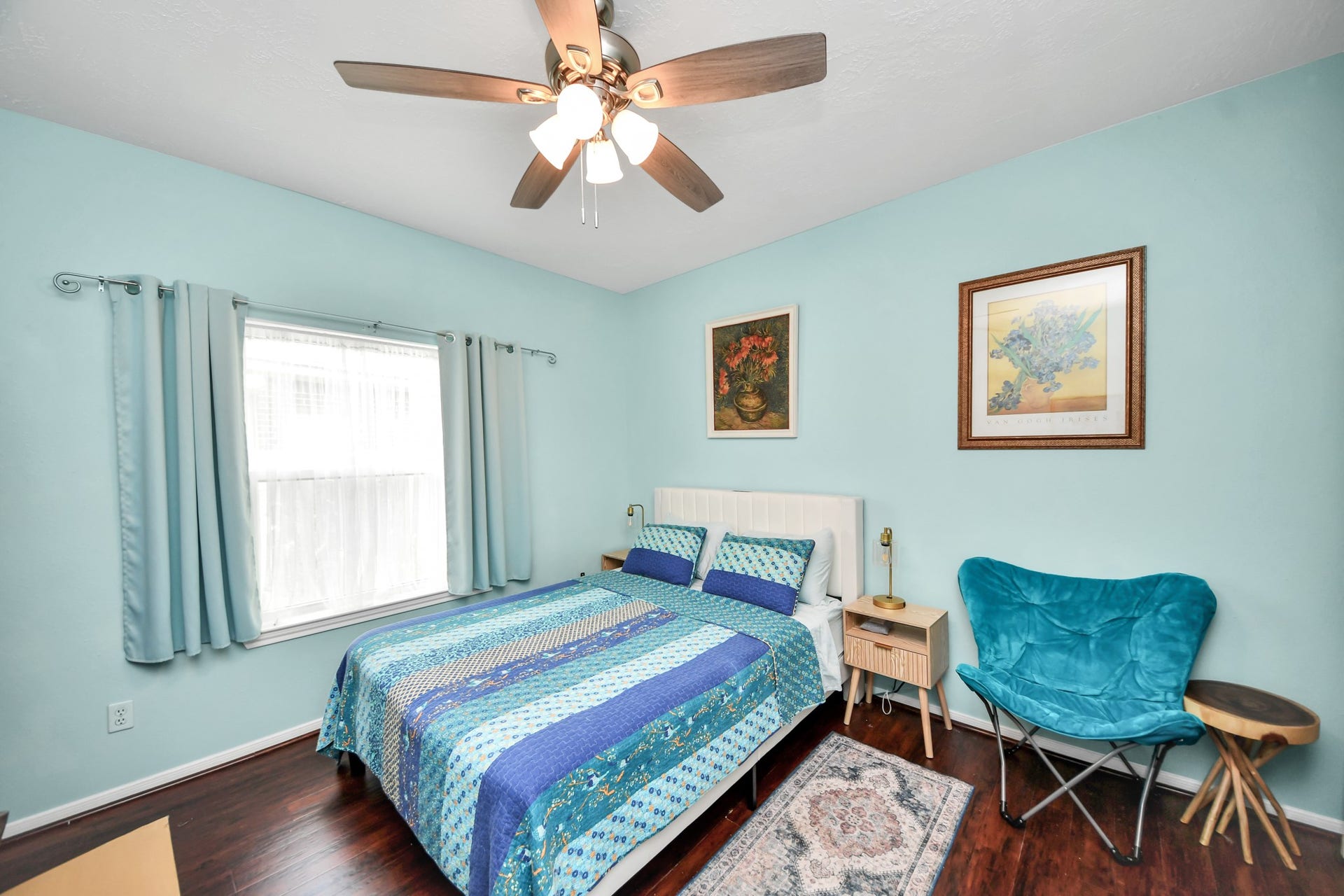 Secondary bedroom with a ceiling fan, good natural light, and a nicely sized closet.
