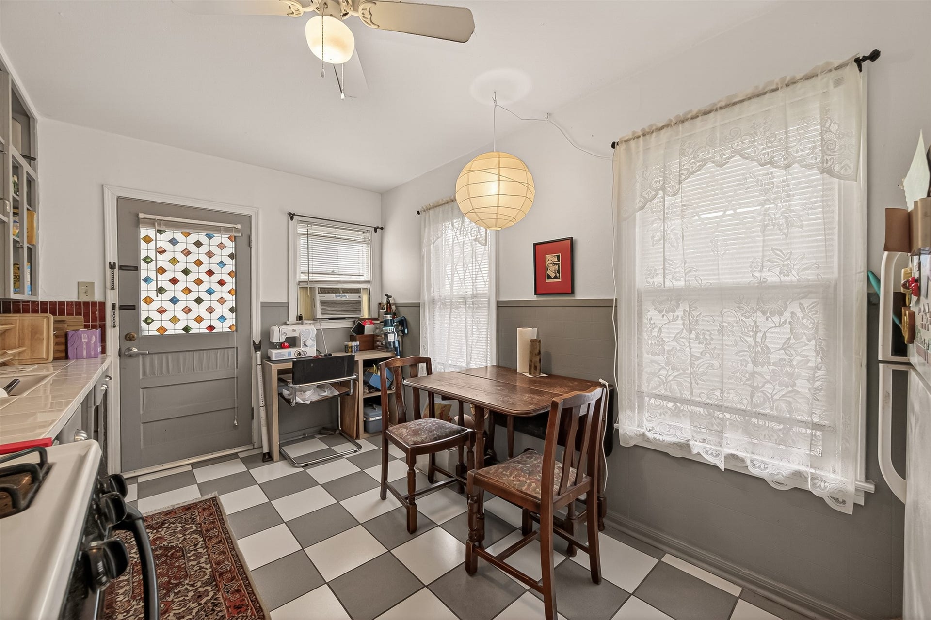 518 N Eastwood Street, Houston, TX 77011 The kitchen offers flexibility beyond meal prep with room for a small dining set.