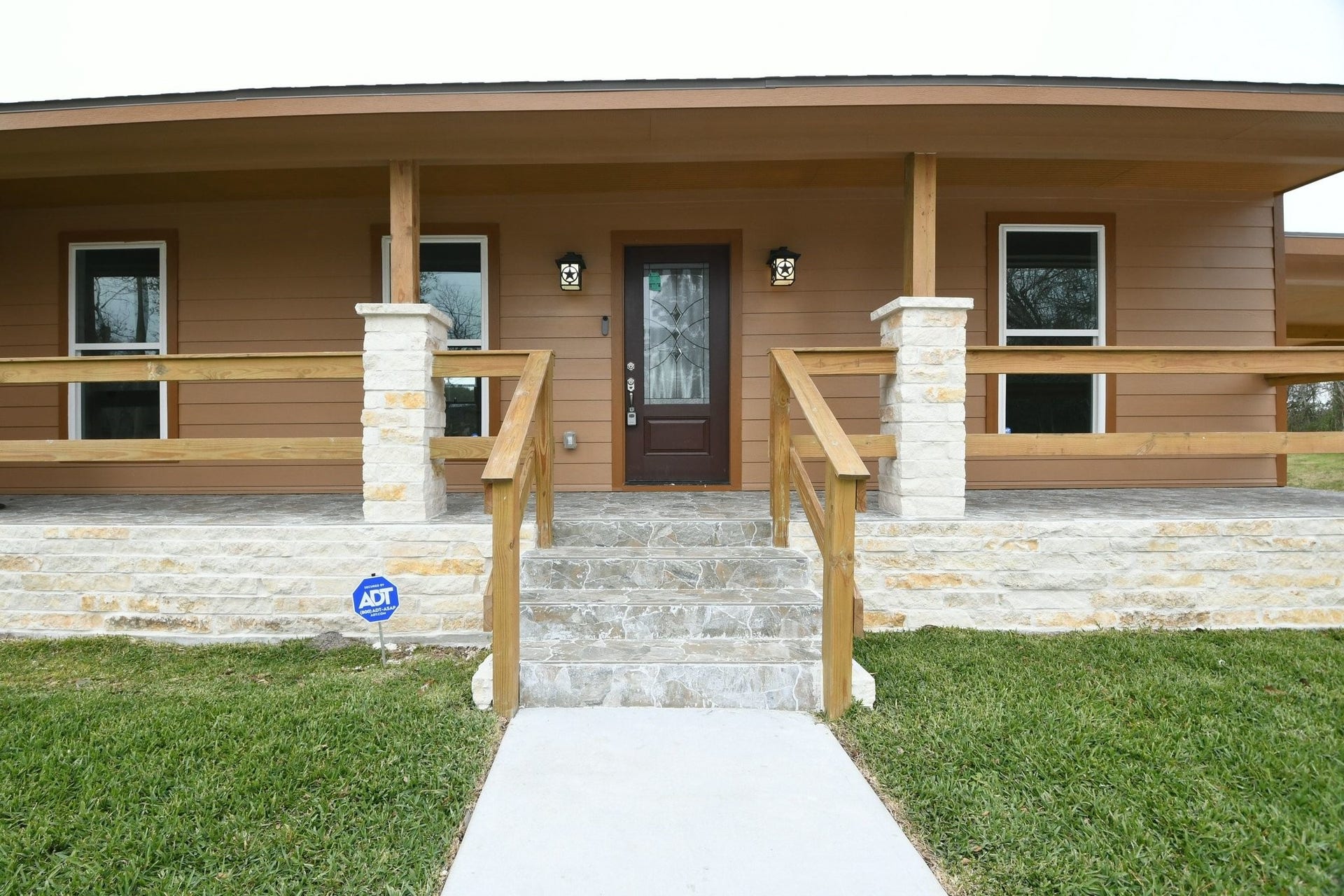 3200 Hoover Street, La Marque, TX 77568 Lovely stone accented from porch