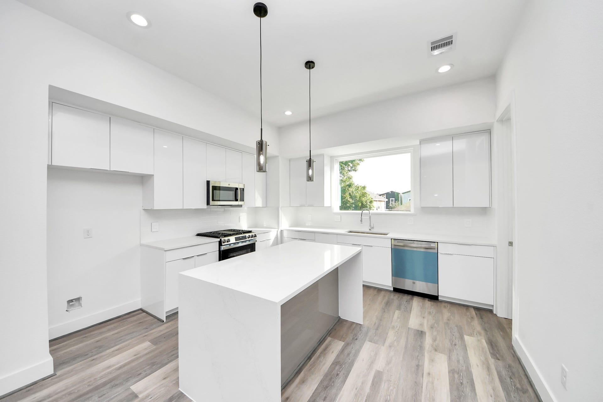 2521 Francis Street, Houston, TX 77004 Kitchen with island on second floor (Sample photo from same floor plan next to the address)