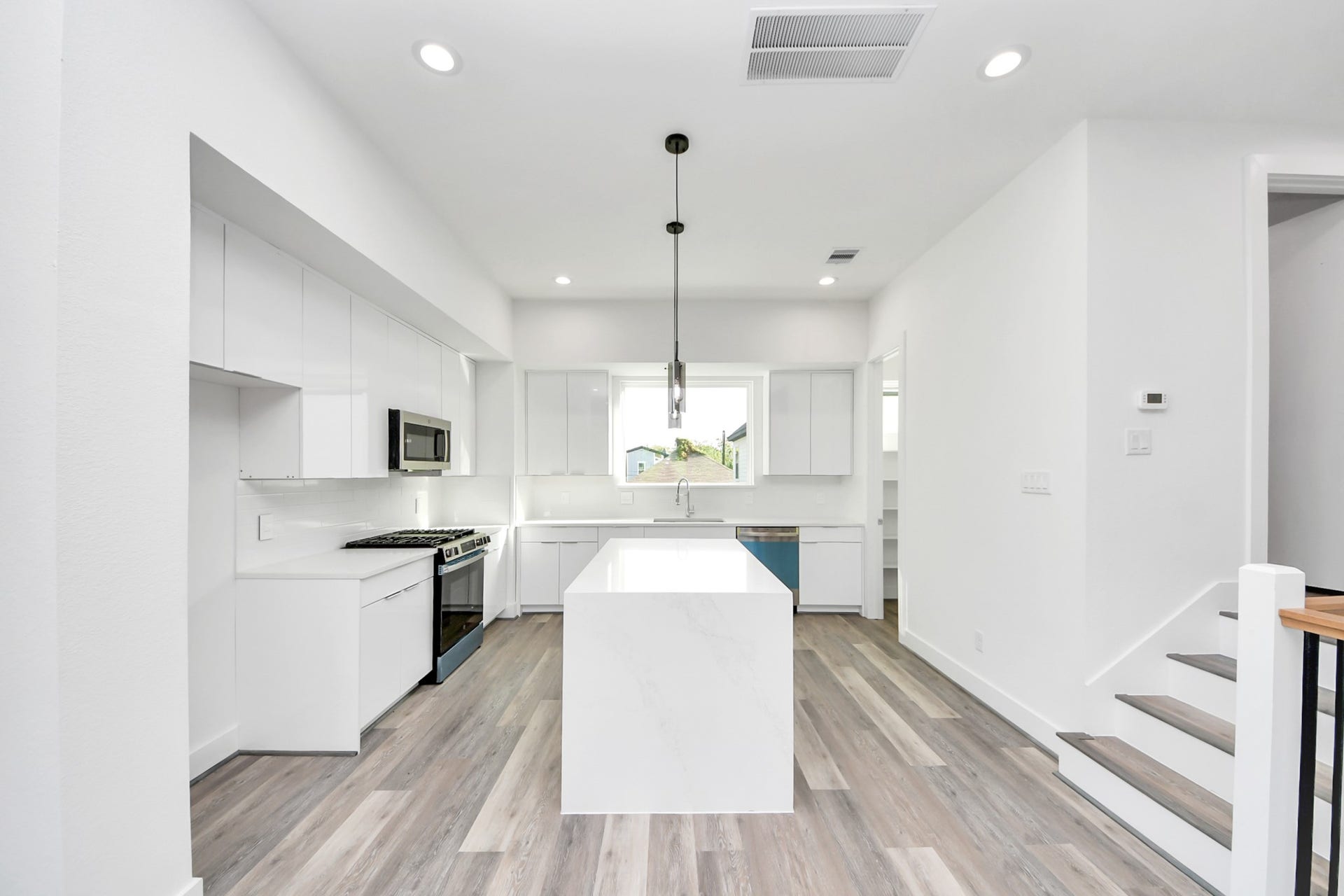 2521 Francis Street, Houston, TX 77004 Kitchen with island second floor (Sample photo from same floor plan next to the address)