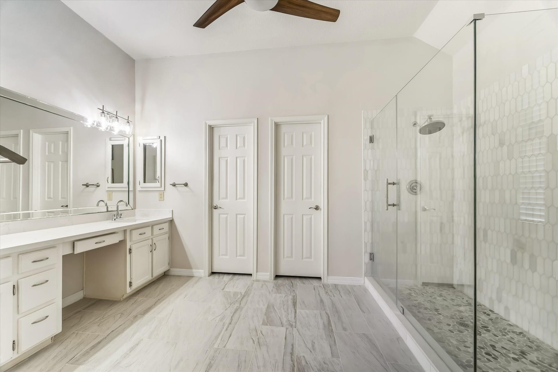LUXURIOUS MASTER BATHROOM WITH AN IMPRESSIVELY SIZED SHOWER