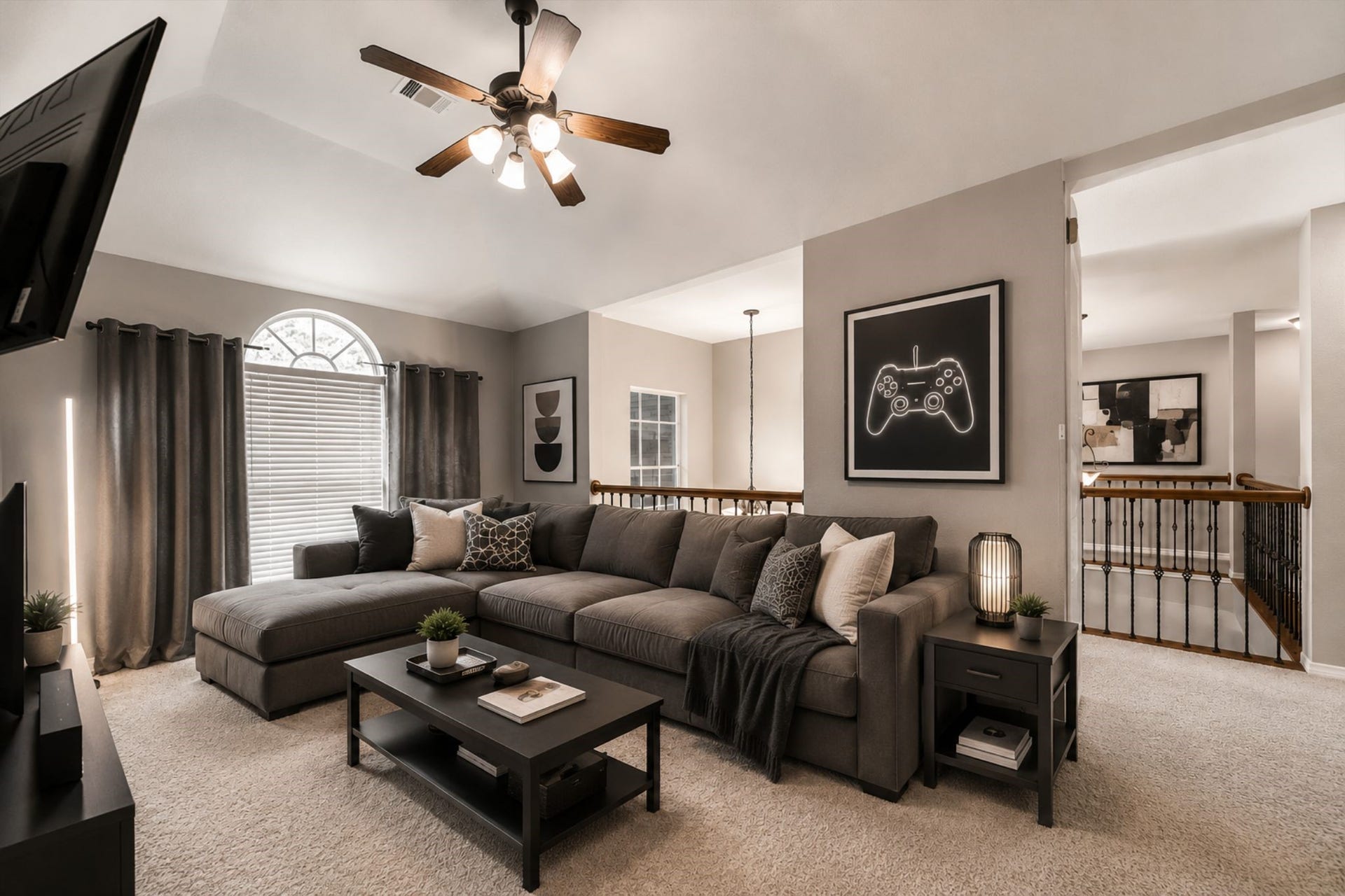 THE GAME ROOM ANCHORS THE SECOND STORY AND IS THE PERFECT SPOT FOR KIDS TO GATHER WITH FRIENDS *Virtually Staged