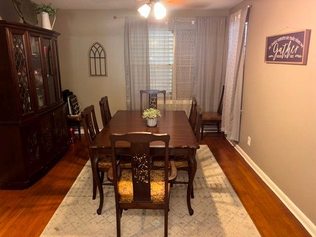 1909 11th Avenue, La Marque, TX 77568 The dining room is next to the kitchen. Nice hardwood floors in the dining room. The window looks out onto the front yard.