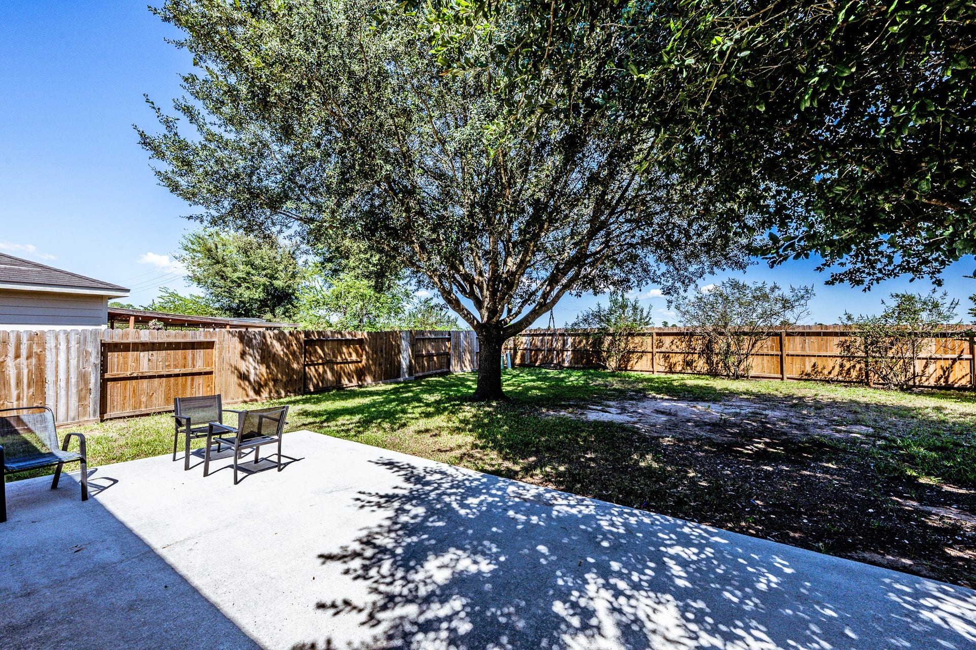 28814 Red River Loop, Spring, TX 77386 Step outside to a spacious backyard featuring a large concrete patio, mature shade trees & a fully fenced yard. With plenty of room for outdoor furniture, grilling & entertaining, this outdoor space offers a great setting for enjoying time with family & friends.